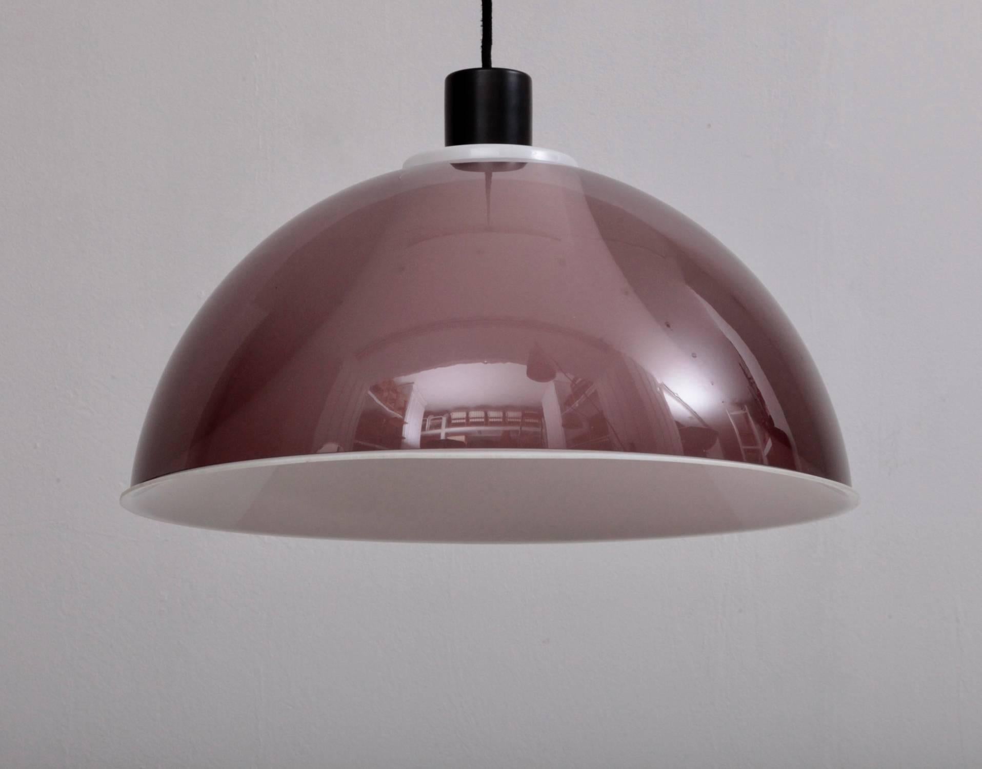 Purple version of the Stilux pendant lamp. Signed and with original canopy in excellent condition.
To be on the safe side, the lamp should be checked locally by a specialist concerning local requirements.

