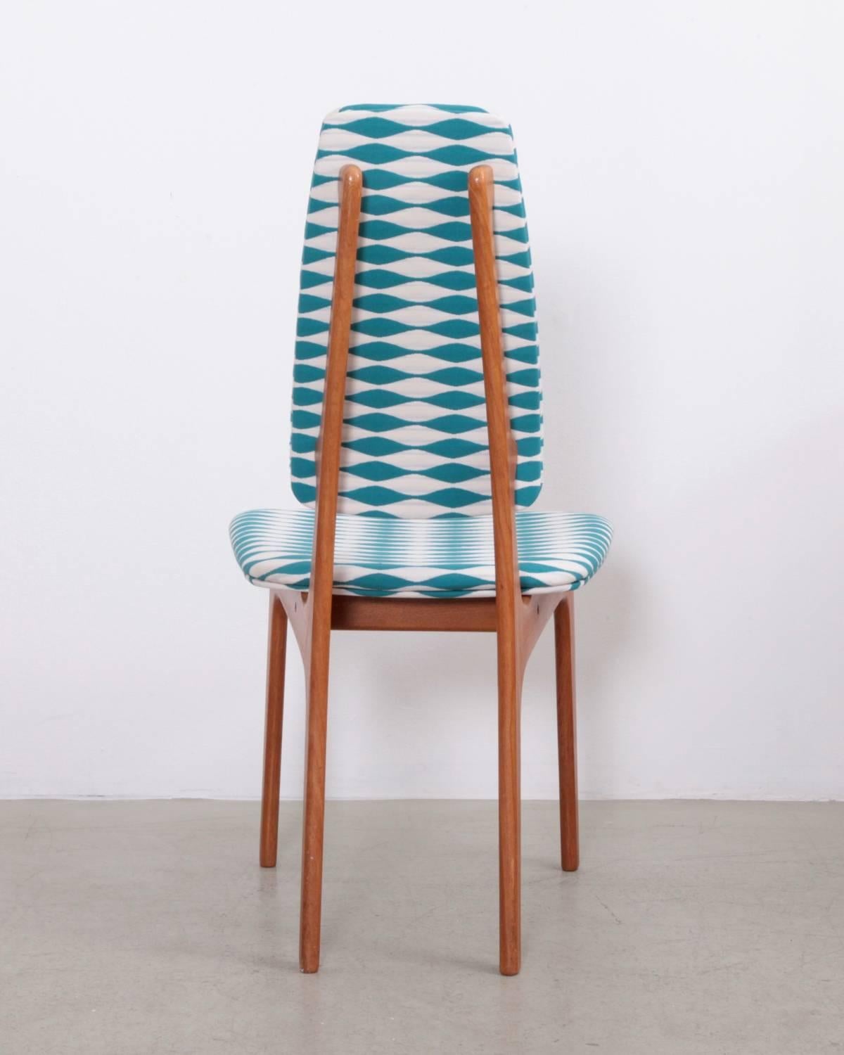 Refurbished dining chair set with new Jonathan Adler fabric in solid teak. A very comfy dining chair!