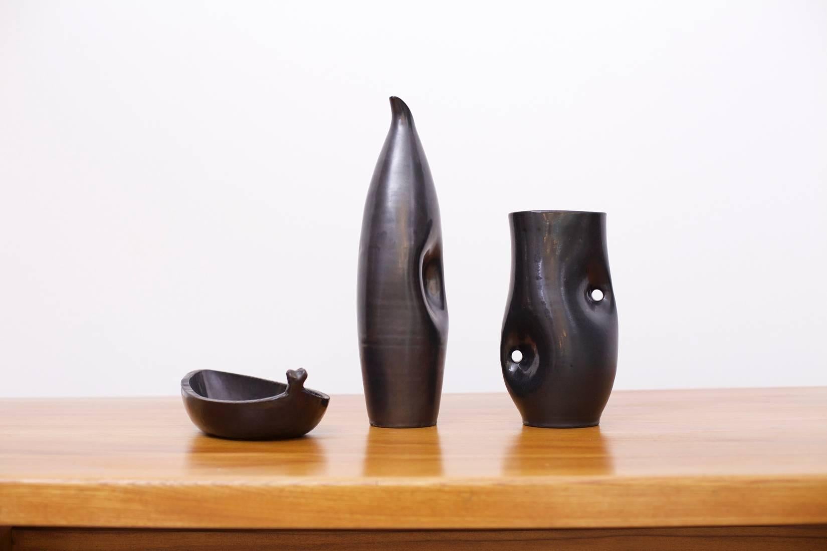 A very hard to find collection of three early Accolay pieces with the characteristic and deep black glaze.
Accolay was a group of 4 young and talented ceramicists who started to produce in 1945. The condition is stated as very good.

 