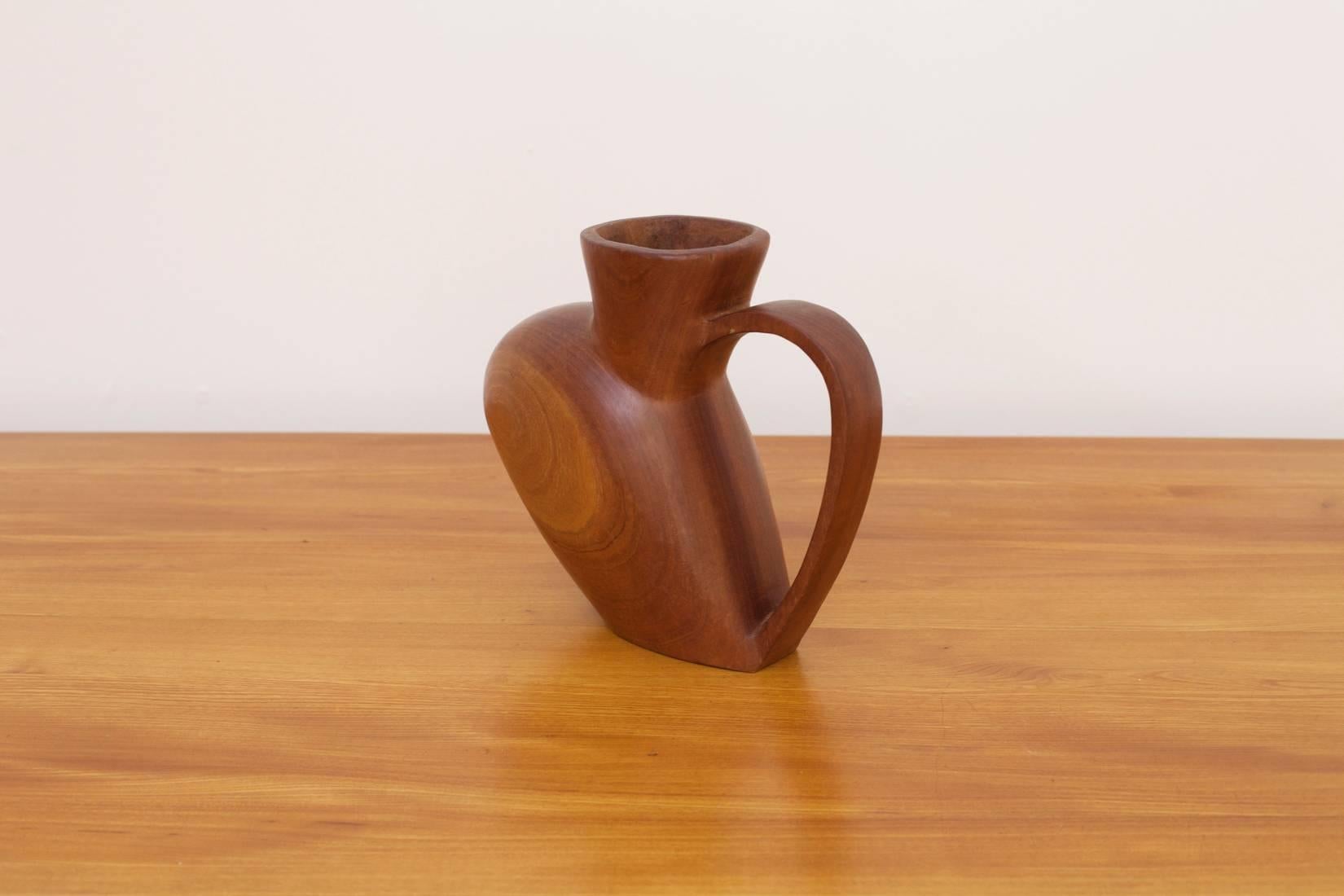 Huge and heavy wooden pitcher from the 1970s in excellent condition.

