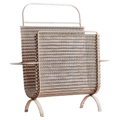 A. Mathieu Matégot Portariviste pieghevole