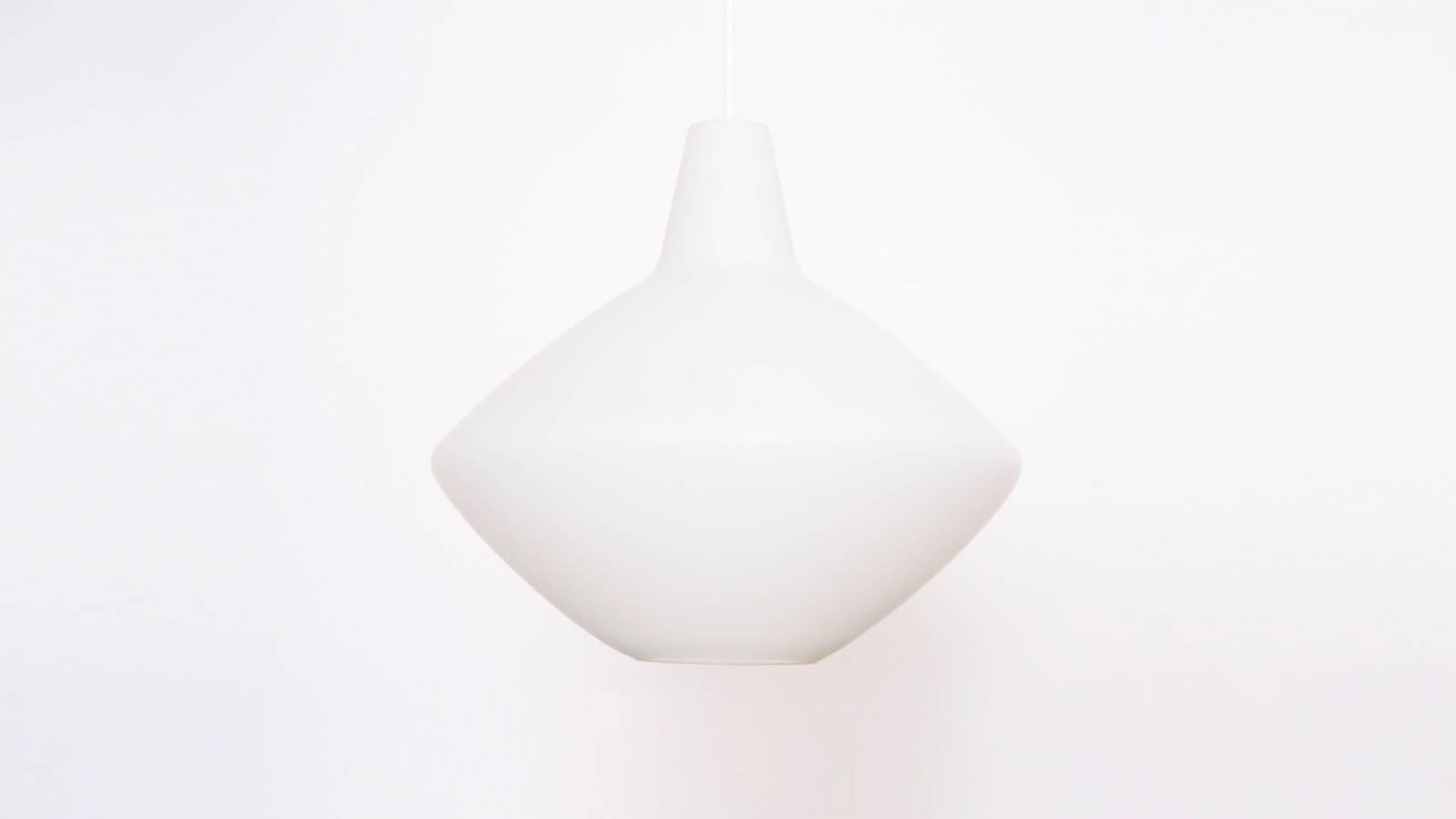 Pair of Lisa Johansson-Pape Kantiga Iöken glass pendant lamp in excellent condition.
To be on the safe side, the lamp should be checked locally by a specialist concerning local requirements.