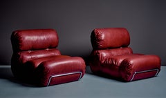 Newly upholstered Pair of Space Age Lounge Chairs attributed to Gastone Rinaldi