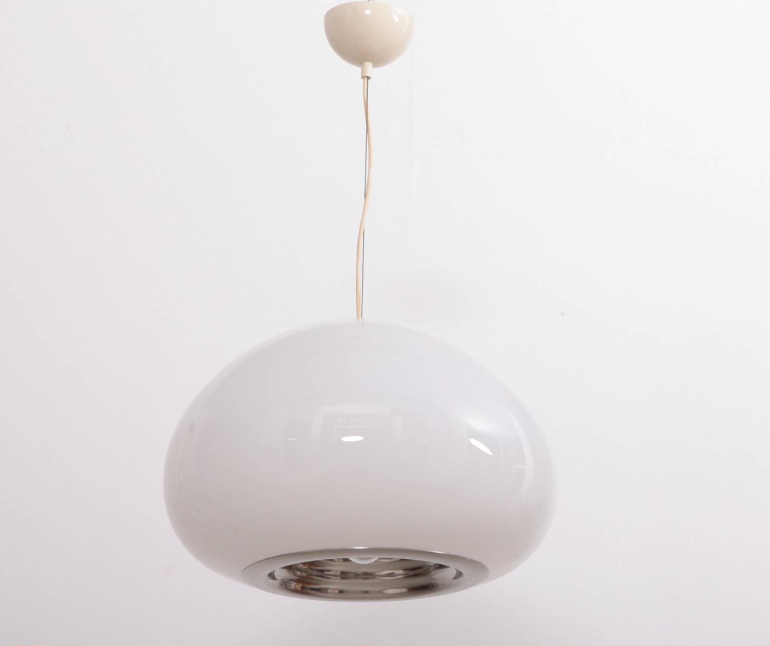 Pendant lamp with opal glass bowl for diffused light. For concentrated light a polished aluminium reflector is fitted to the base with a silver domed reflector bulb. 