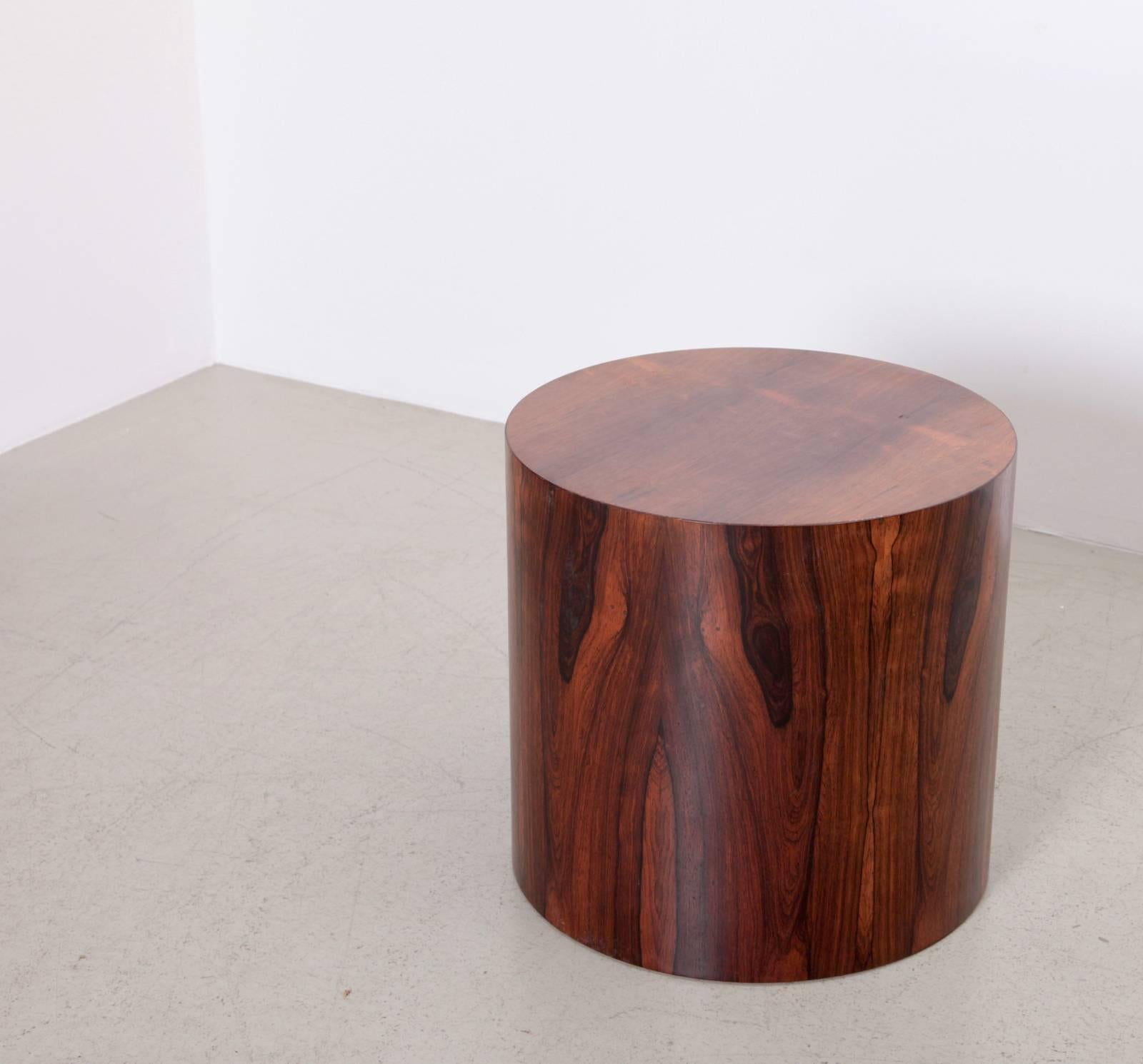 This Mid-Century modern side table designed by Milo Baughman and made by Thayer Coggin. A round, drum-style design in rosewood with an outstanding and hard to find grain in very good condition.