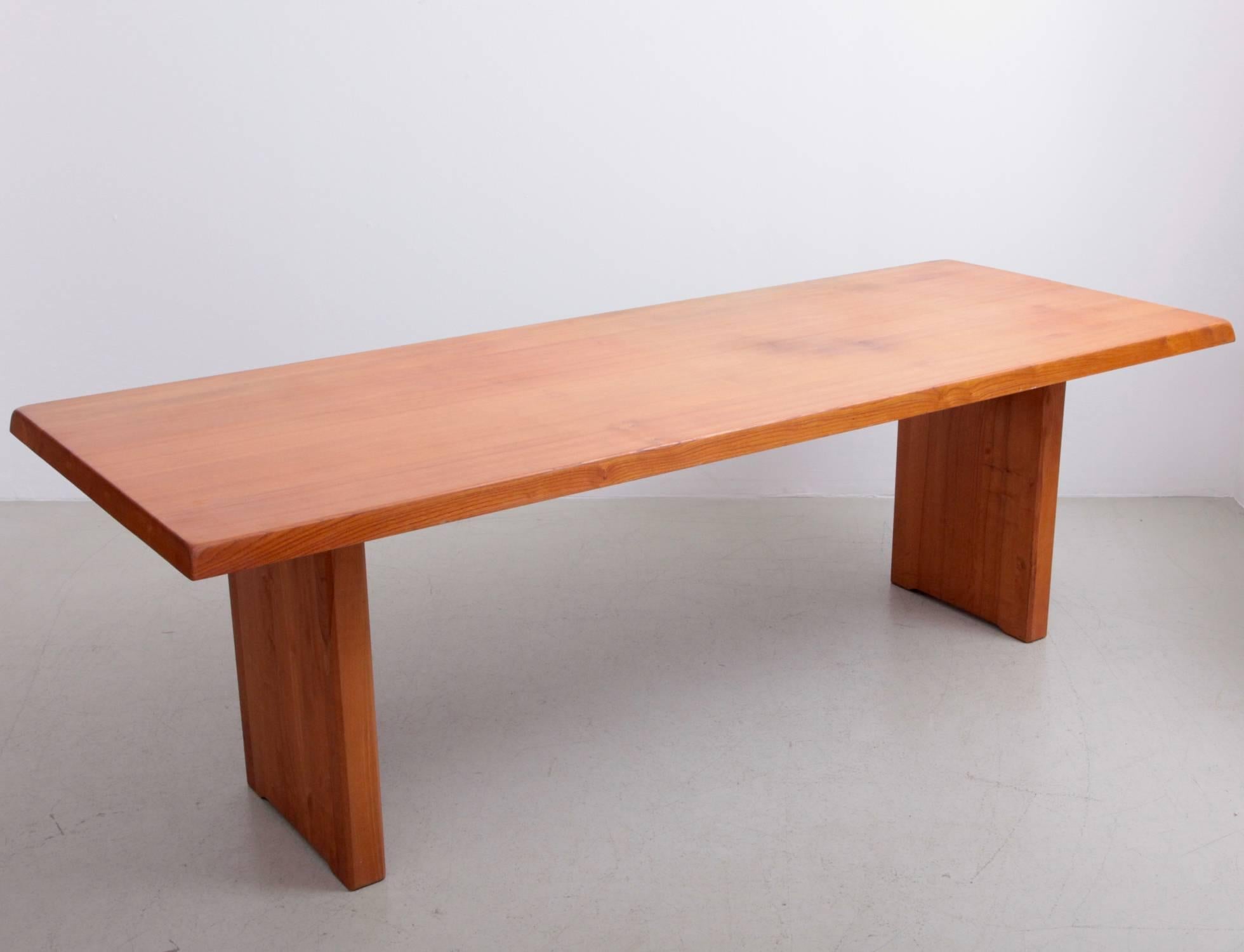 This is a rare larger version of a Classic Pierre Chapo dining table design. Made in solid elm and Charlotte Perriand like wooden connections. A French Classic high quality table in excellent condition.

