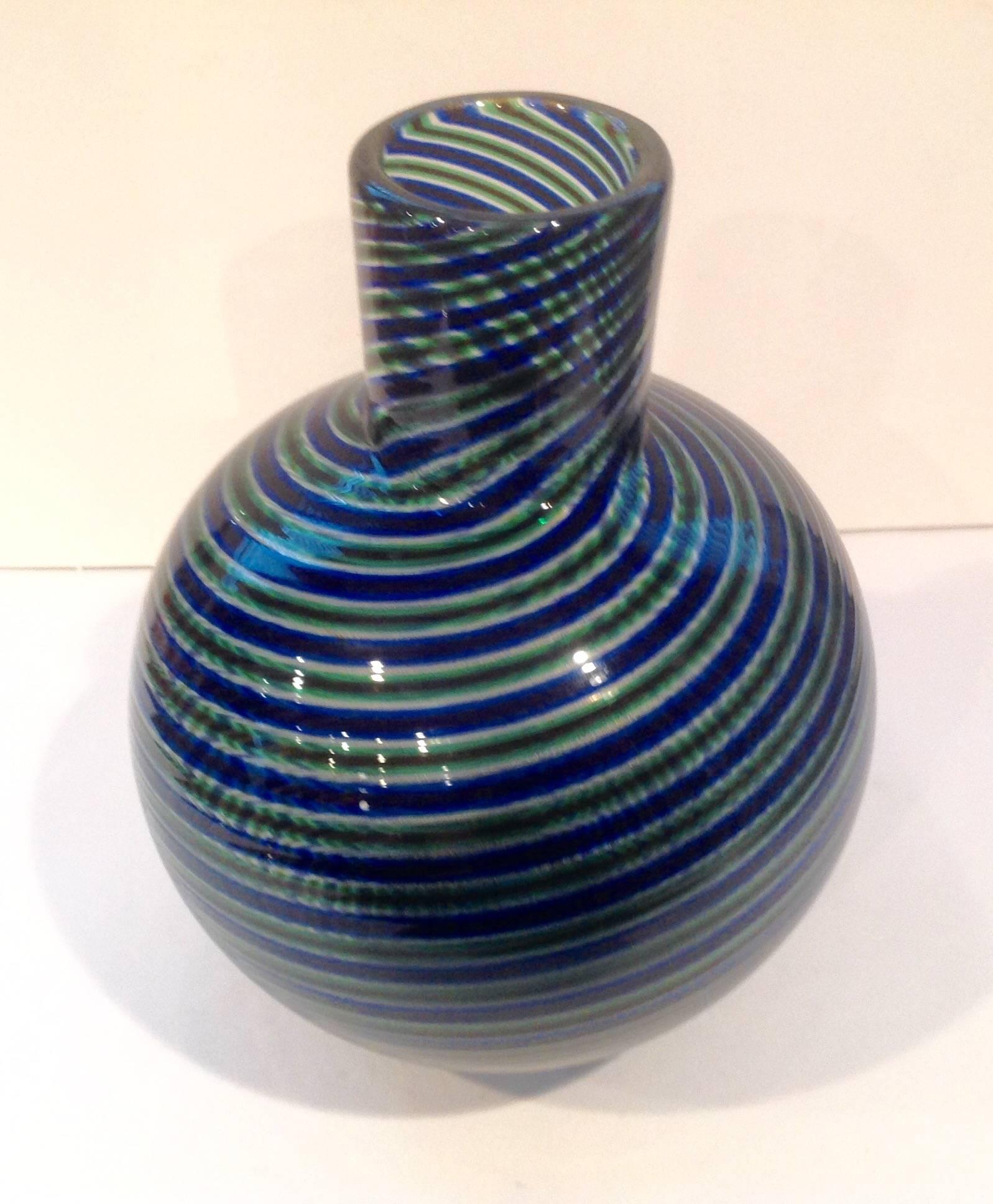 Alternating striped glass vase with gold highlights by Barovier and Toso. Signed on base.