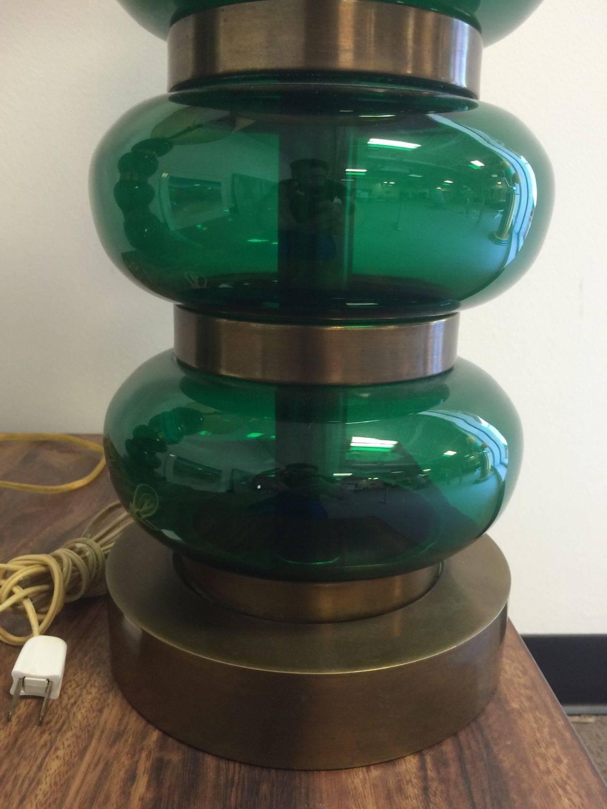 Amazing Pair of Paul Hanson Brass and Green Glass orb lamps. These lamps really make a statement.