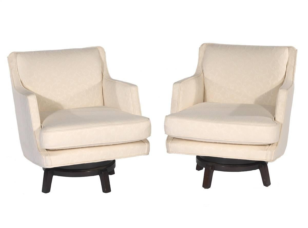 Rare pair of Edward Wormley for Dunbar swivel chairs.