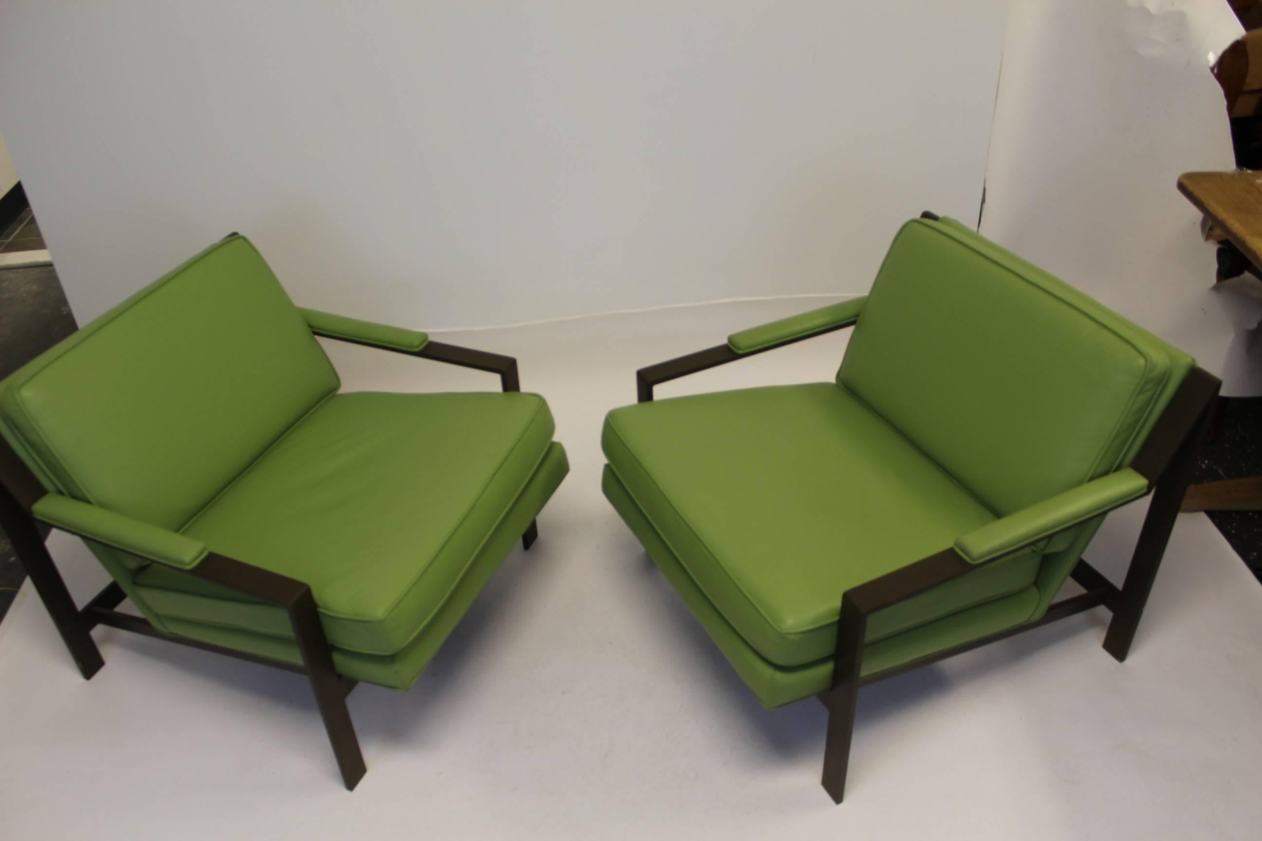 Wonderful pair of Cy Mann lounge chairs in bronze color metal with vibrant green original leather upholstery.