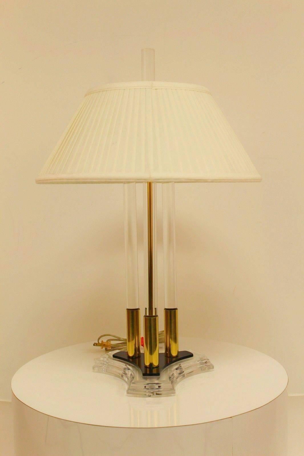 Pair of clear Lucite, black Lucite and brass lamps by Bauer Lamp Company. Original silk shades.