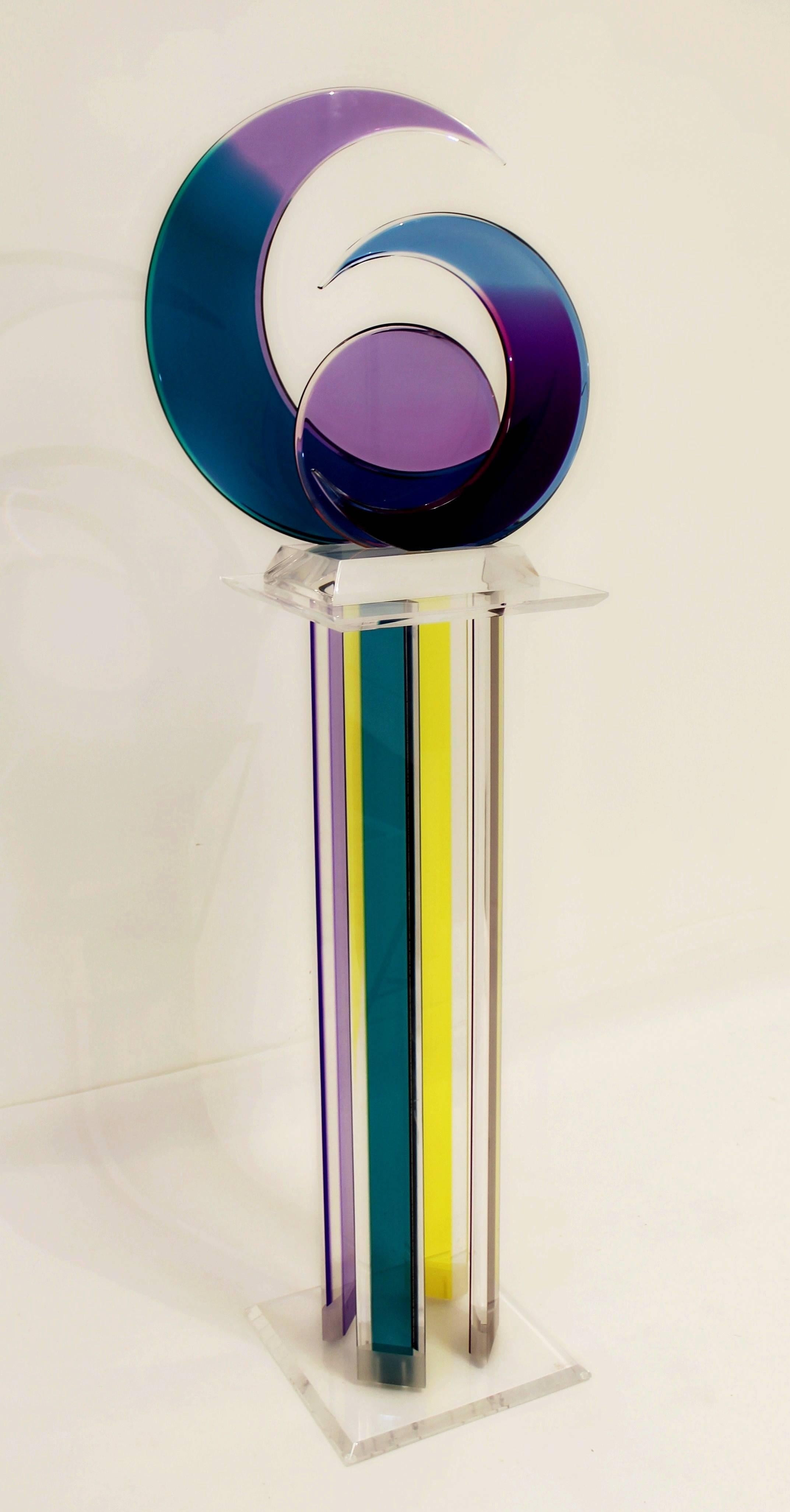 Two-piece set - A luminescent, transparent, lunar sculpture made of Lucite, and a funky, multi-color Stand or pedestal made of Lucite by Shlomi Haziza, both signed, and in excellent condition. The dimensions of the sculpture are 20