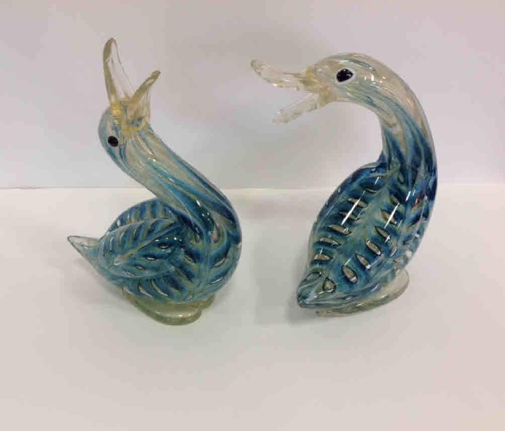 Rare pair of Barovier and Toso Graffito Barbarico Ducks designed by Ercole Barovier, circa 1960s. Taller duck is 10 by 6.25 by 3.75 inches. Smaller duck is 9 by 7 by 3.5 inches.