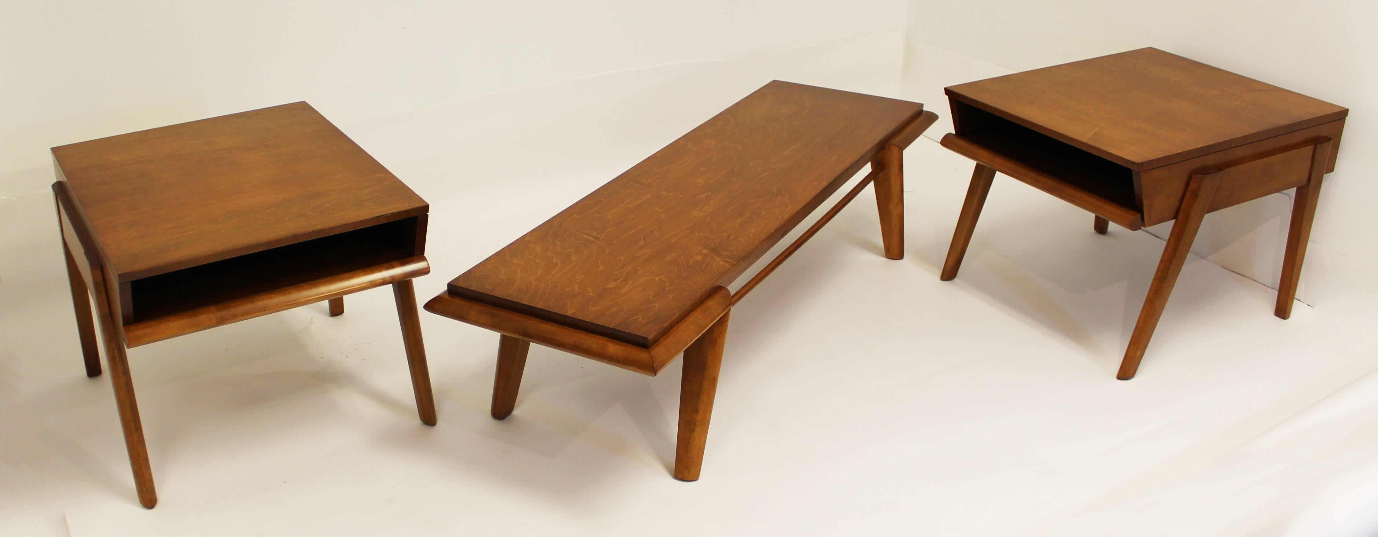 Coffee and end table set by John Keal for Brown Saltman, circa 1953. The perfectly angled hard rock maple has been professionally refinished and is in excellent condition. Personally signed by John Keal. The dimensions of the coffee table are 59.5