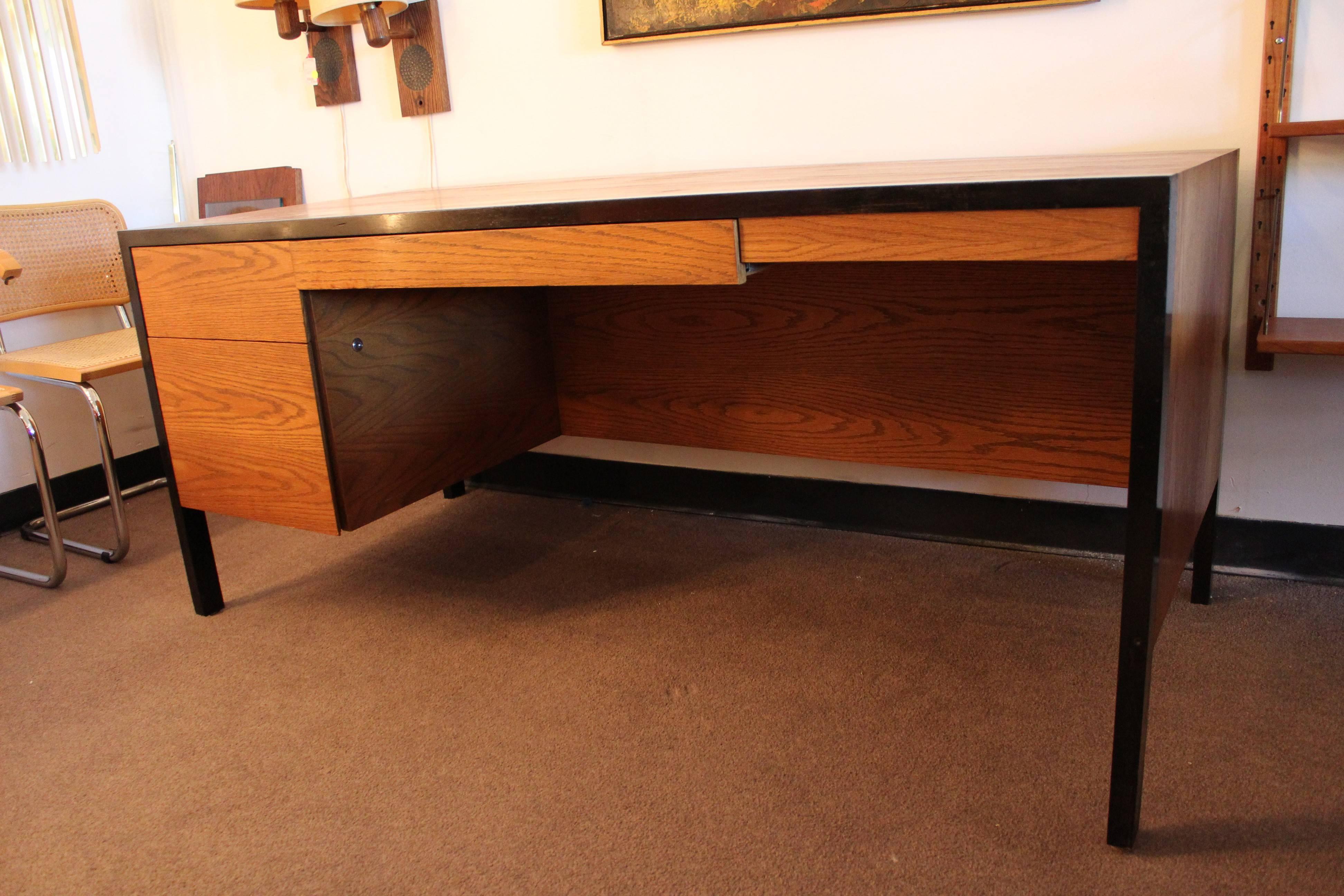 A stunning executive desk by Harvey Probber, circa 1960s. In very good vintage condition. Retains original tags. The dimensions are 66