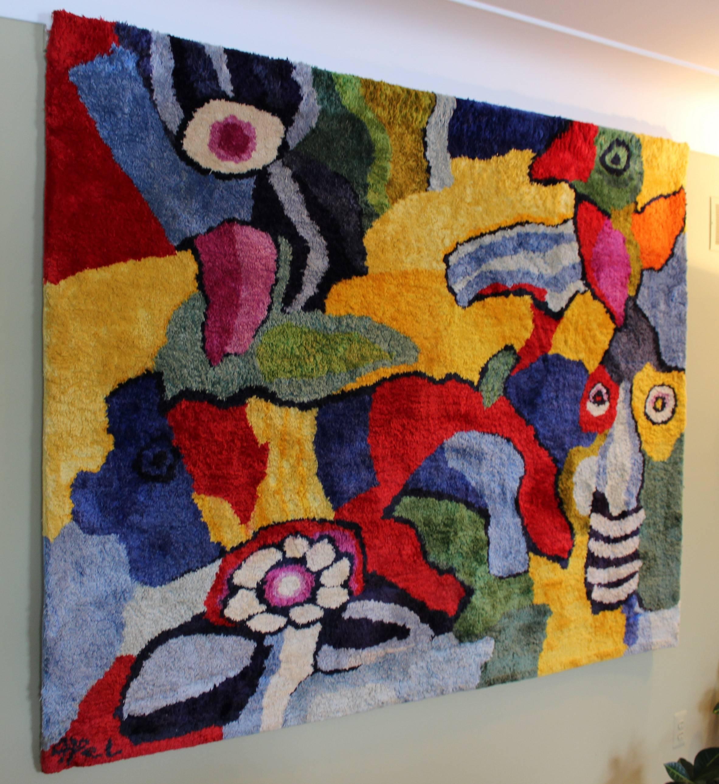 An amazing example of Appel's work in a wonderful rug/ wall hanging. Vibrant colors, whimsical imagery, a great complement to any decor. This stunning rug measures in at 82
