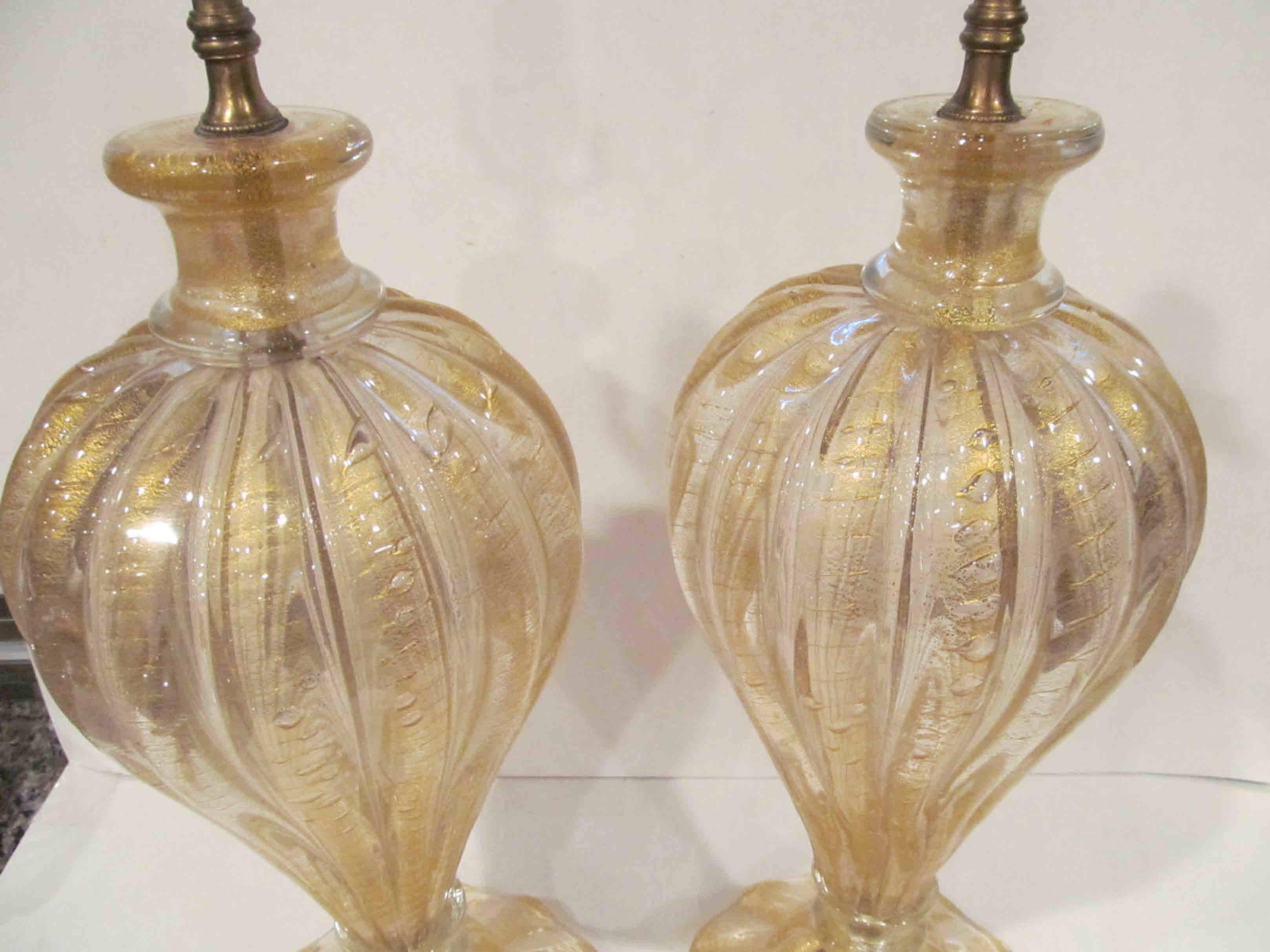 Wonderful and rare sculptural Murano pair of lamps designed by Barovier and Toso. The technique is Cordonato D'Oro. Glass height is 15.75 inches.