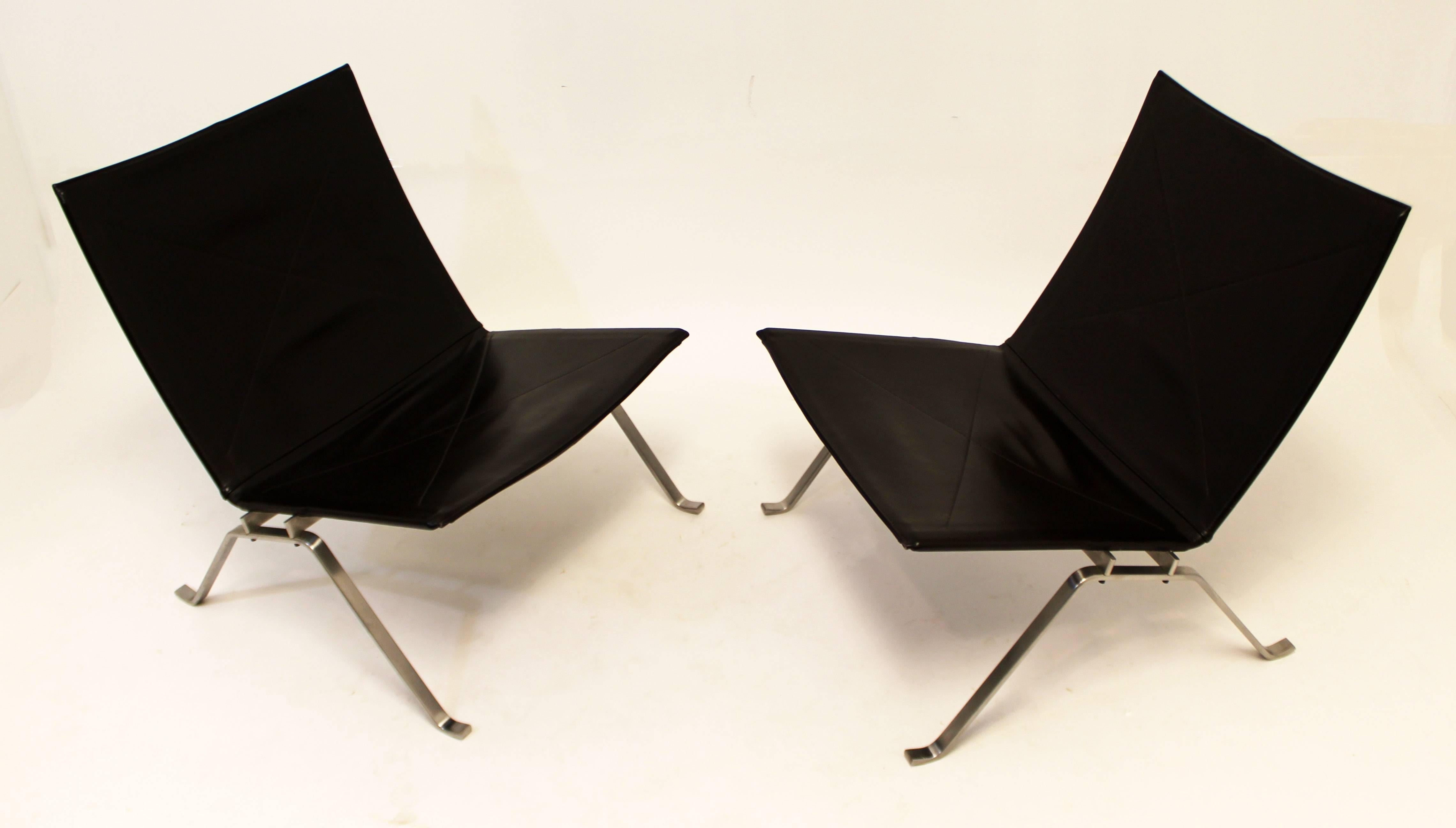 Poul Kjaerholm PK22 for Fritz Hansen lounge chairs. These original signed PK22 chairs have the original label on bottom. The color of the leather is dark brown.