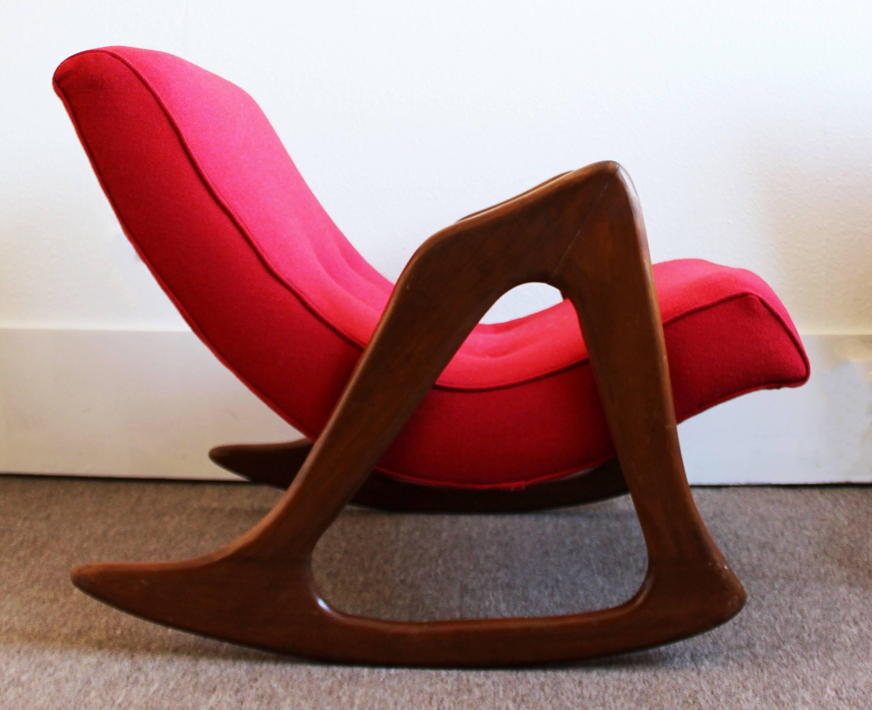 Comfortable, sturdy sculptural statement rocking chair by Adrian Pearsall. Made of solid walnut and professionally reupholstered in authentic vintage Halindale fabric. In excellent condition. The dimensions are 26" W x 36" (3') D x