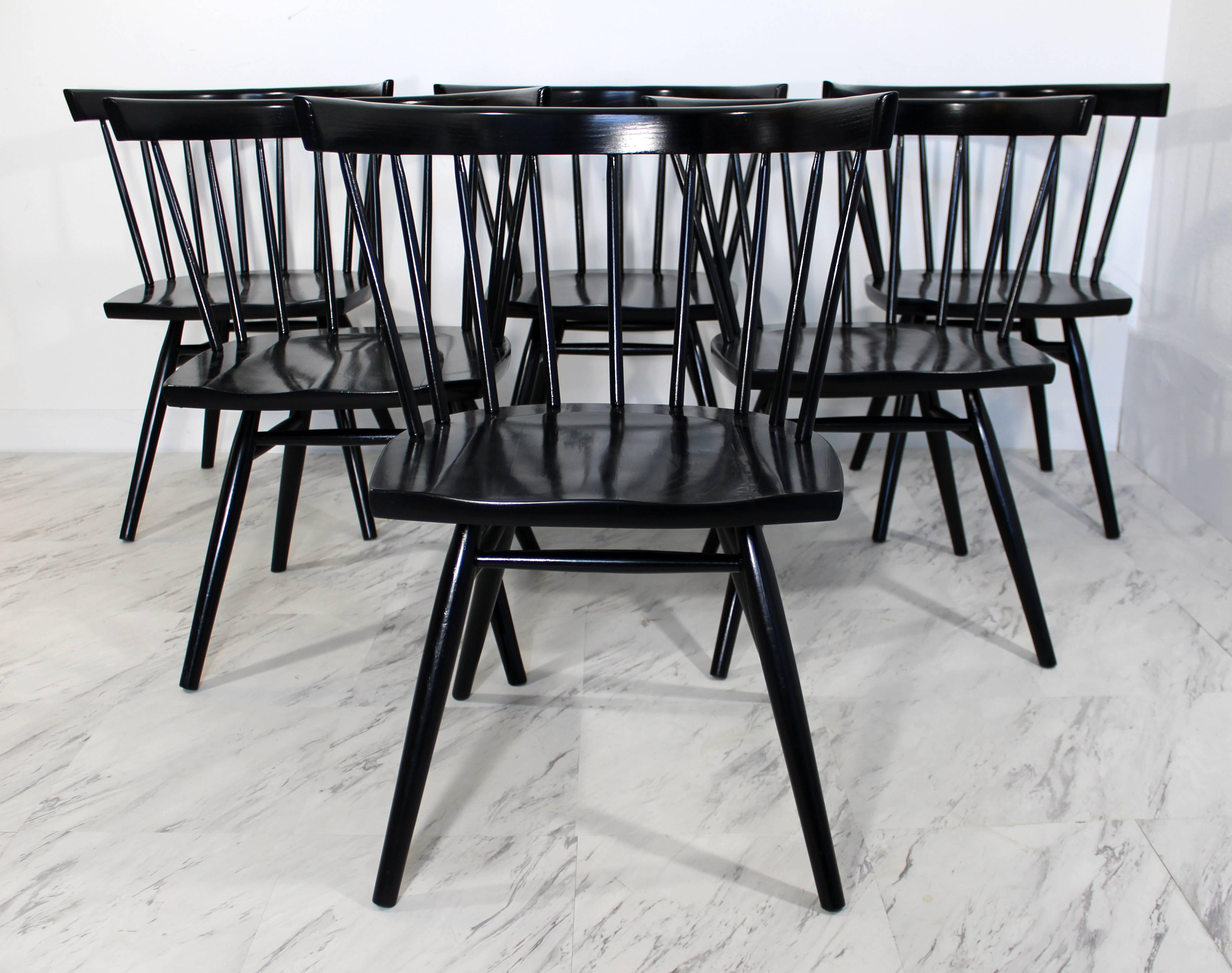 Stunning set of six dining chairs by George Nakashima for Knoll, Model N19 called the straight chair. These have been professionally redone in a beautiful semi gloss black, while still being able to see the wood grain pattern. In excellent