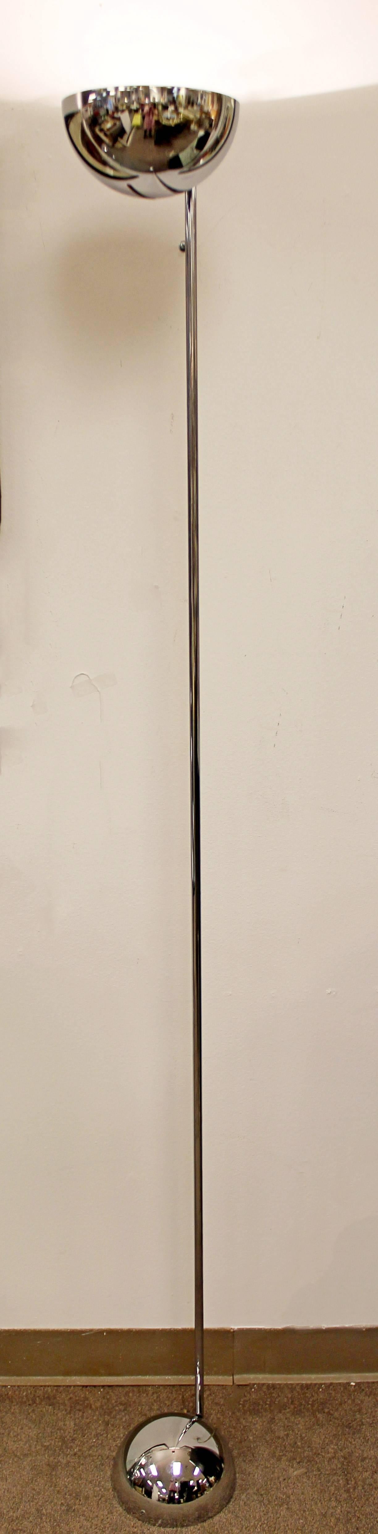 For your consideration is a pair of chrome, torchiere floor lamps, by Robert Sonneman. In excellent condition. The dimensions are 7