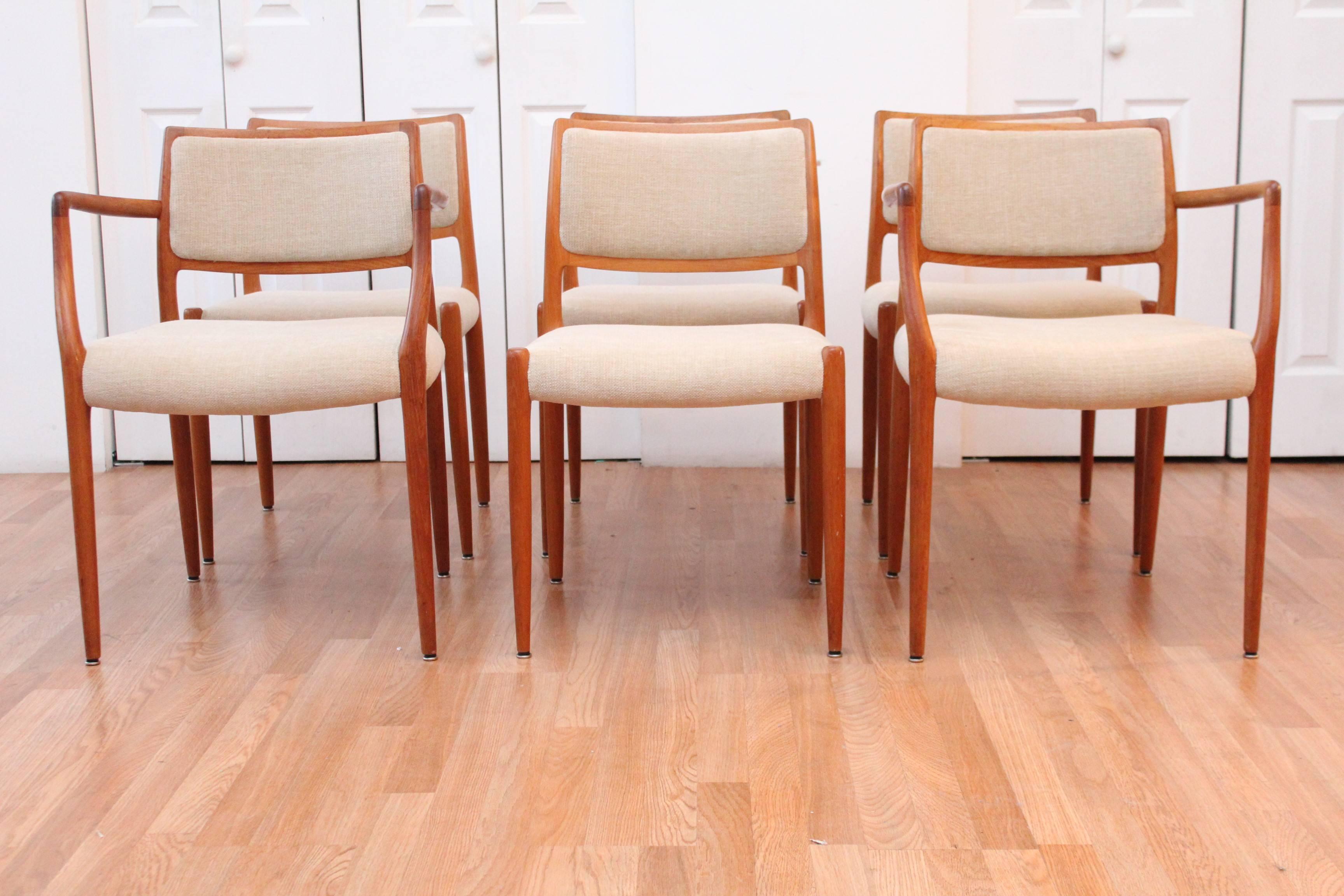 Set of six Danish modern dining chairs designed by Niels Otto Møller, for J.L. Moller, Denmark. Branded with the JL Moller signature, these chairs are a testament to superbly constructed Scandinavian Modern vintage design. All chairs