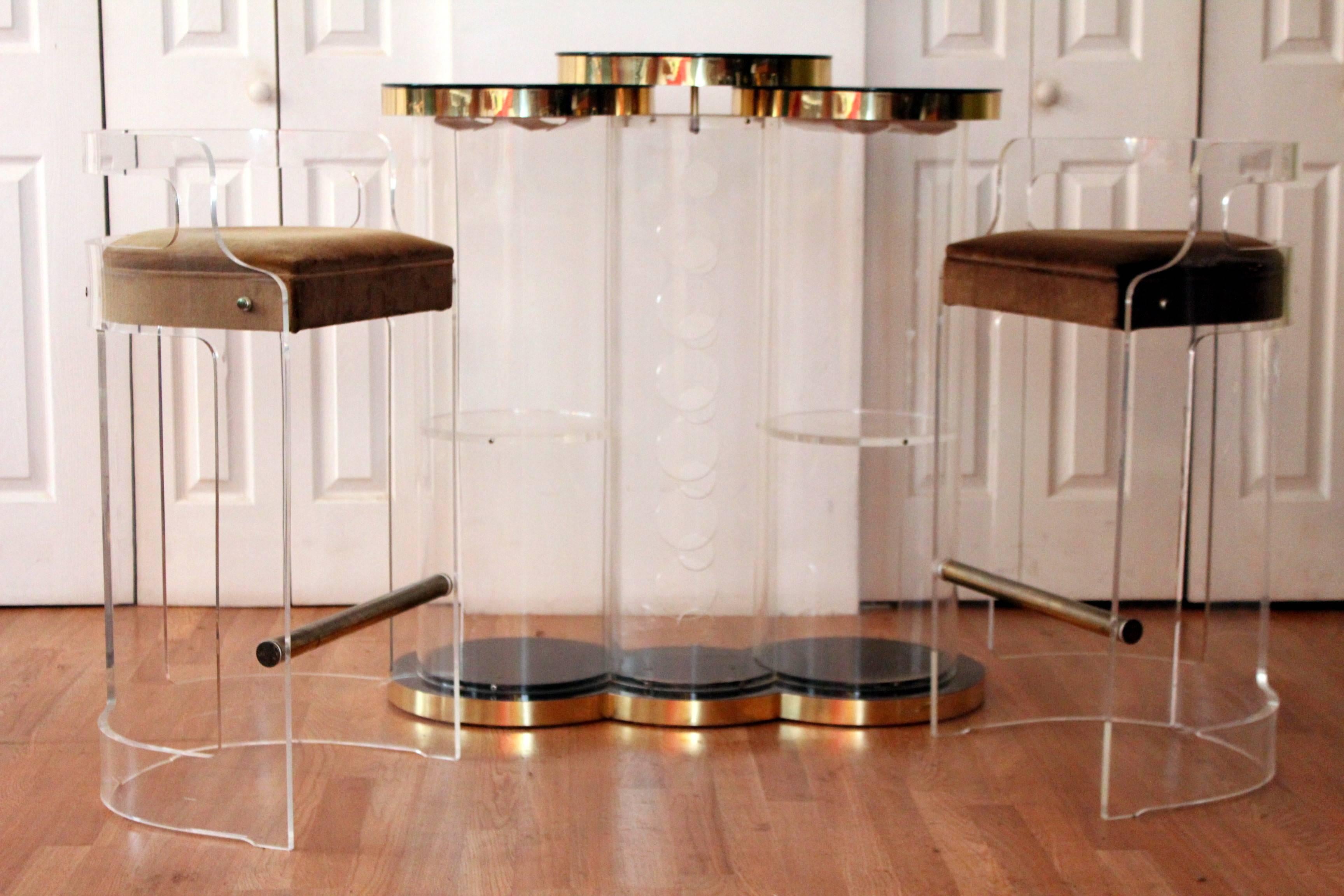 Pair of Charles Hollis Jones style high design bar stools with a low back with cut-outs, a chrome footrest and an upholstered seat. The designers favourite for allowing light to matriculate into a small space. 

The bar (unknown designer) is