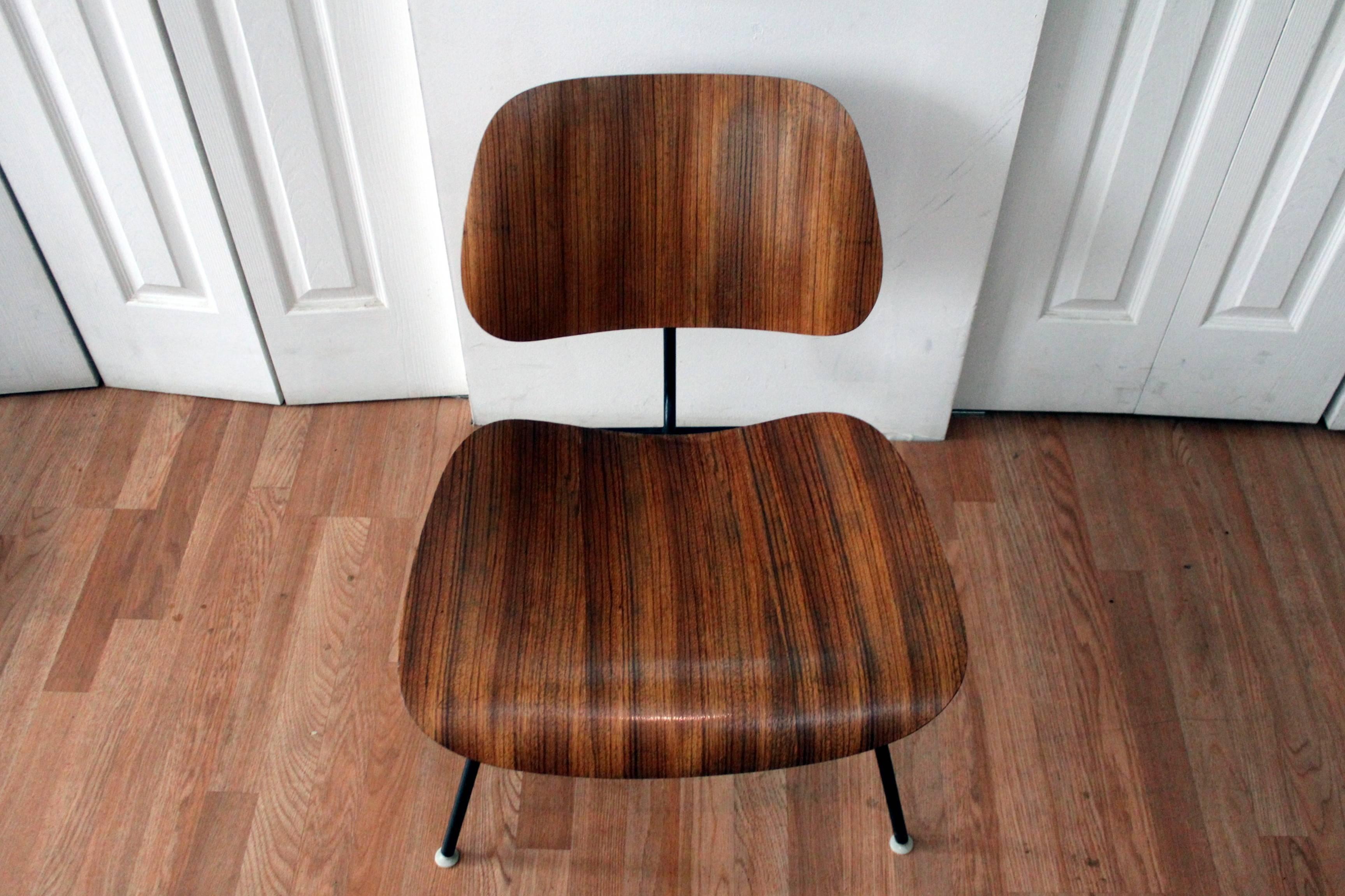 All original Classic early Eames LCM zebra wood lounge chair. Original labels, nylon glides, shock mounts, patina. A rare example of design at its best!