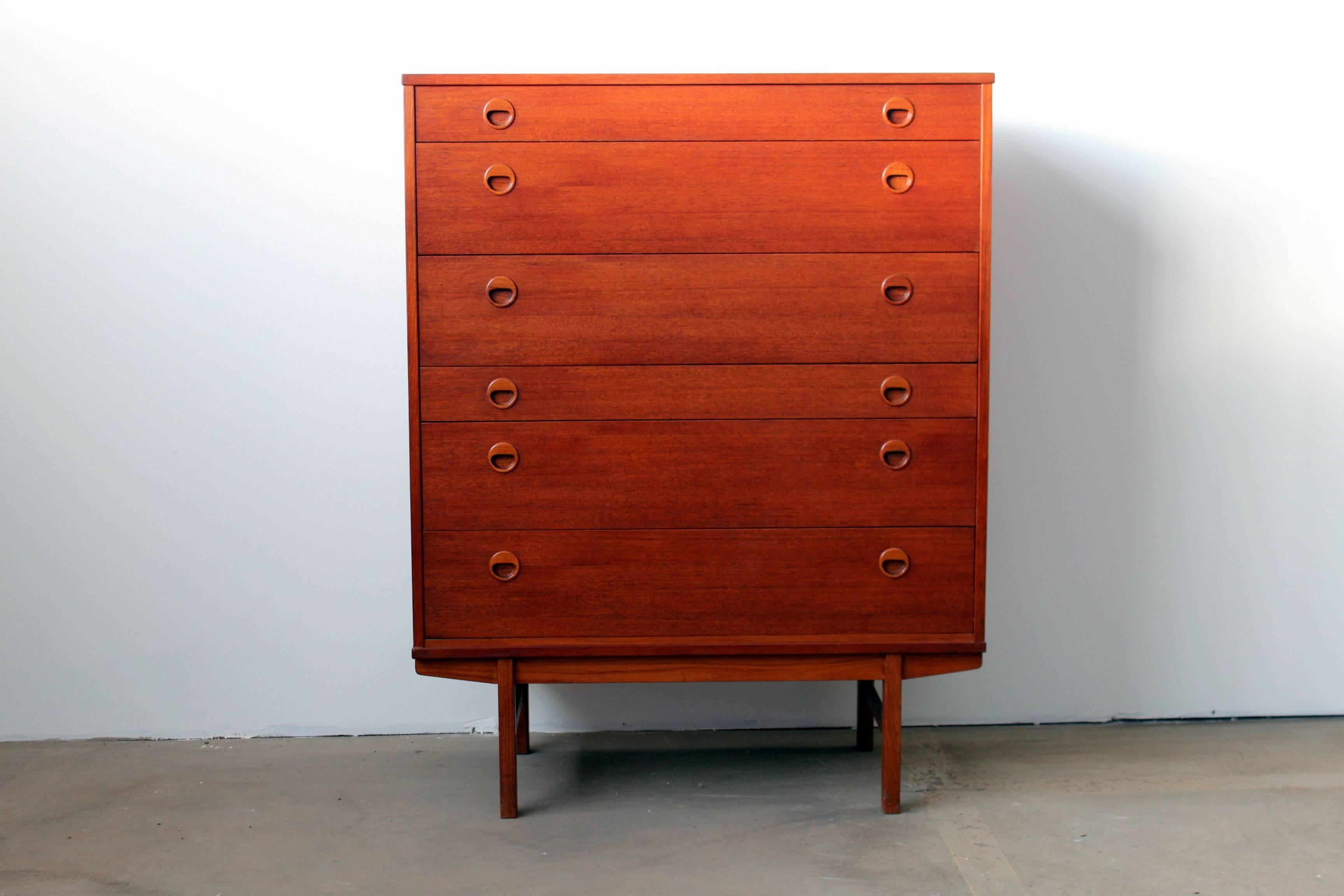 Yngve Ekström designed this quietly unadorned teak highboy dresser for DUX.
Notice the drawers sizes and placement pattern. The 