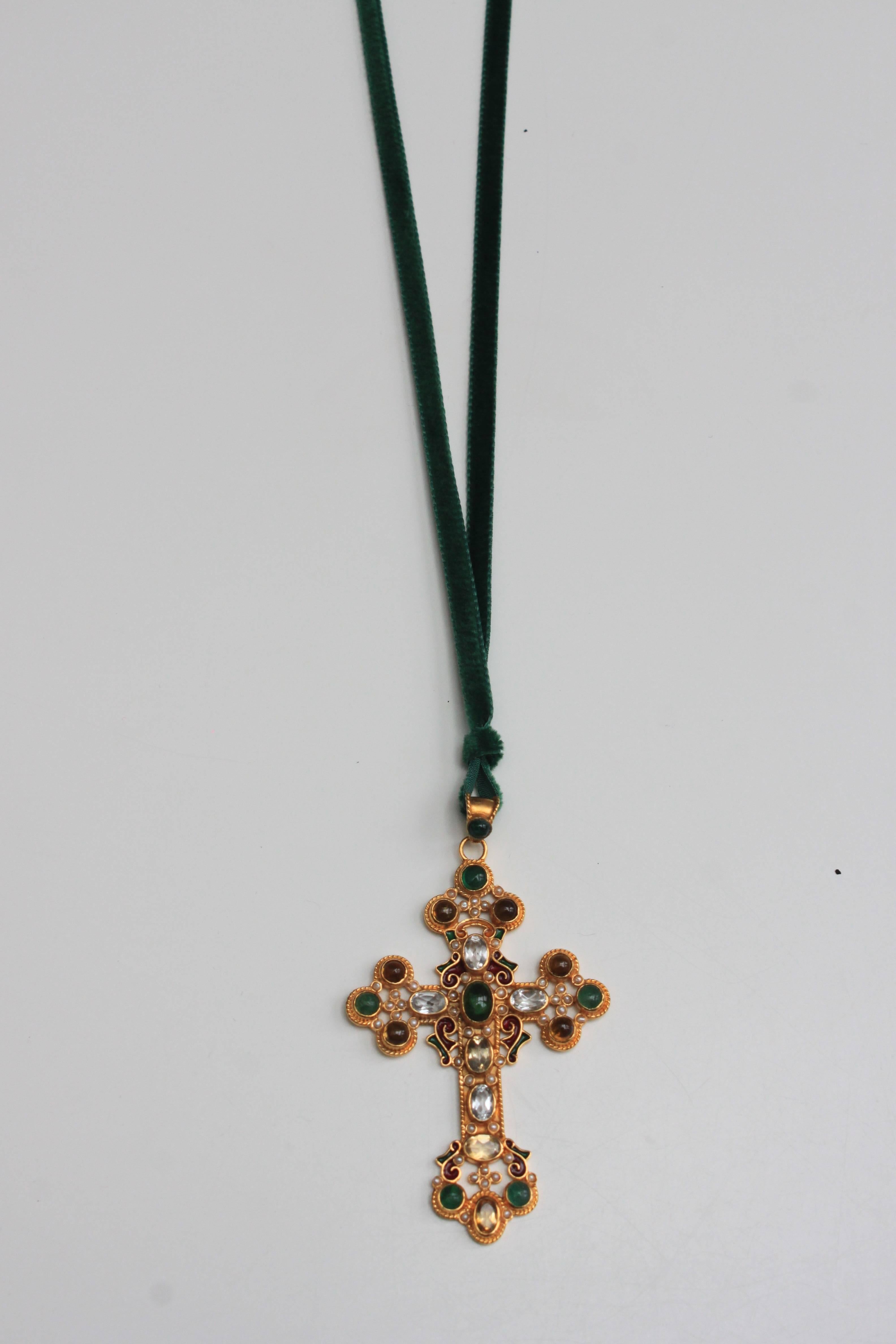 The cross is made from argento silver and gold-plated with precious stones citrine, garnet, micro pearls. It is a one of a kind piece designed by Diego Percossi Papi as part of an exclusive collection of pendants for the Casa Cabana Pop Up Shop.
