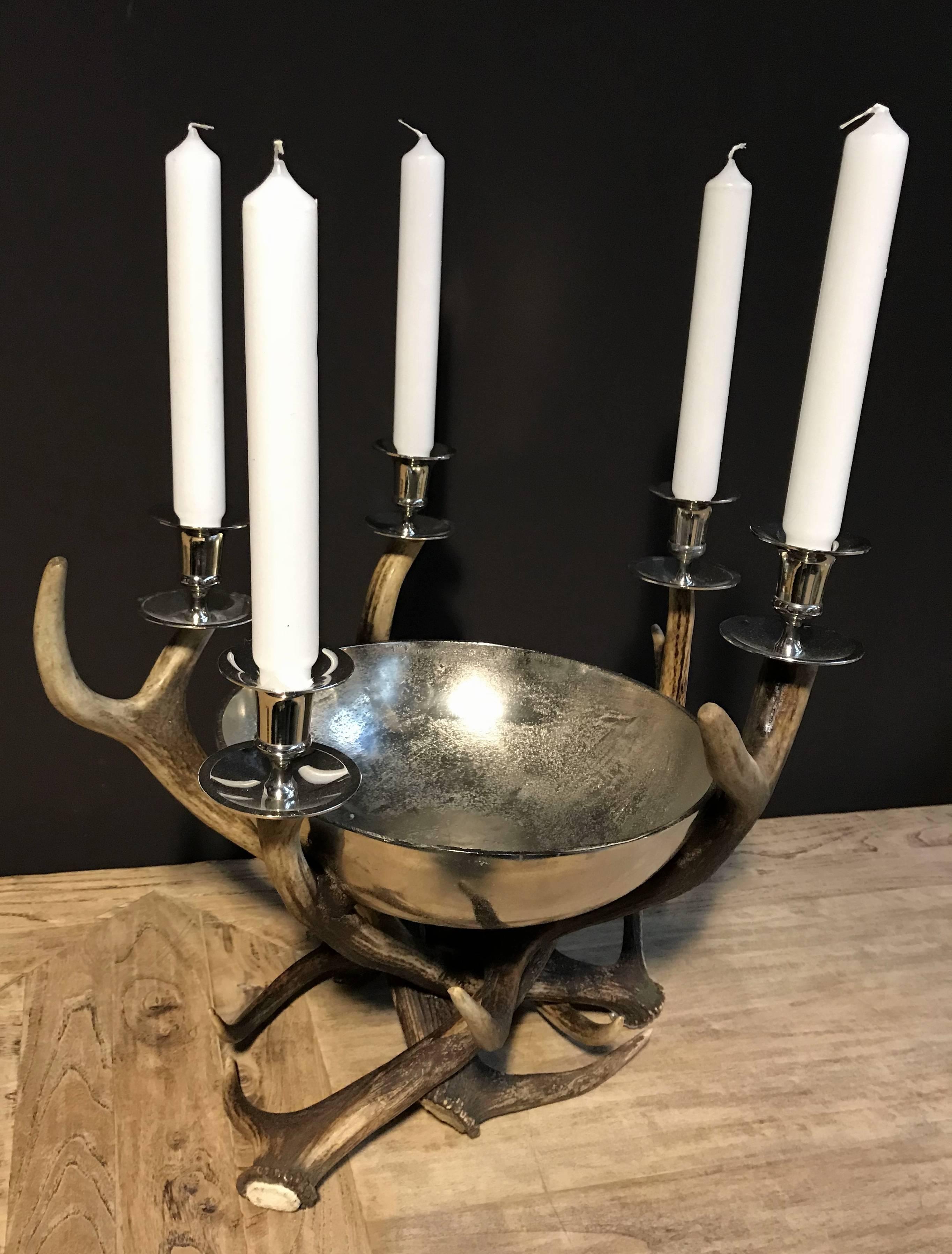 Decorative piece for on a dining table. Made of red deer antlers.