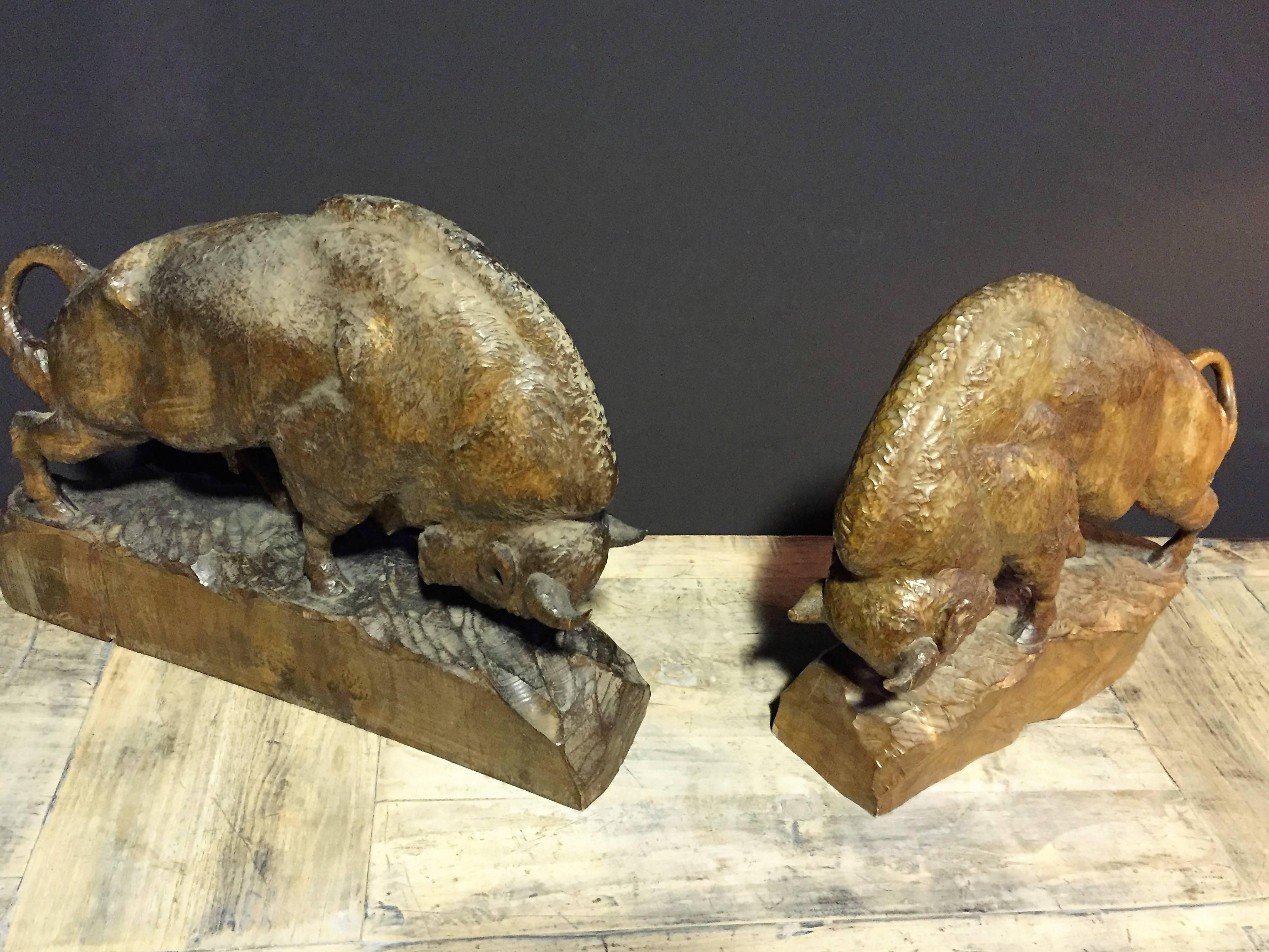 Nice decorative set of hand-carved wooden bisons.