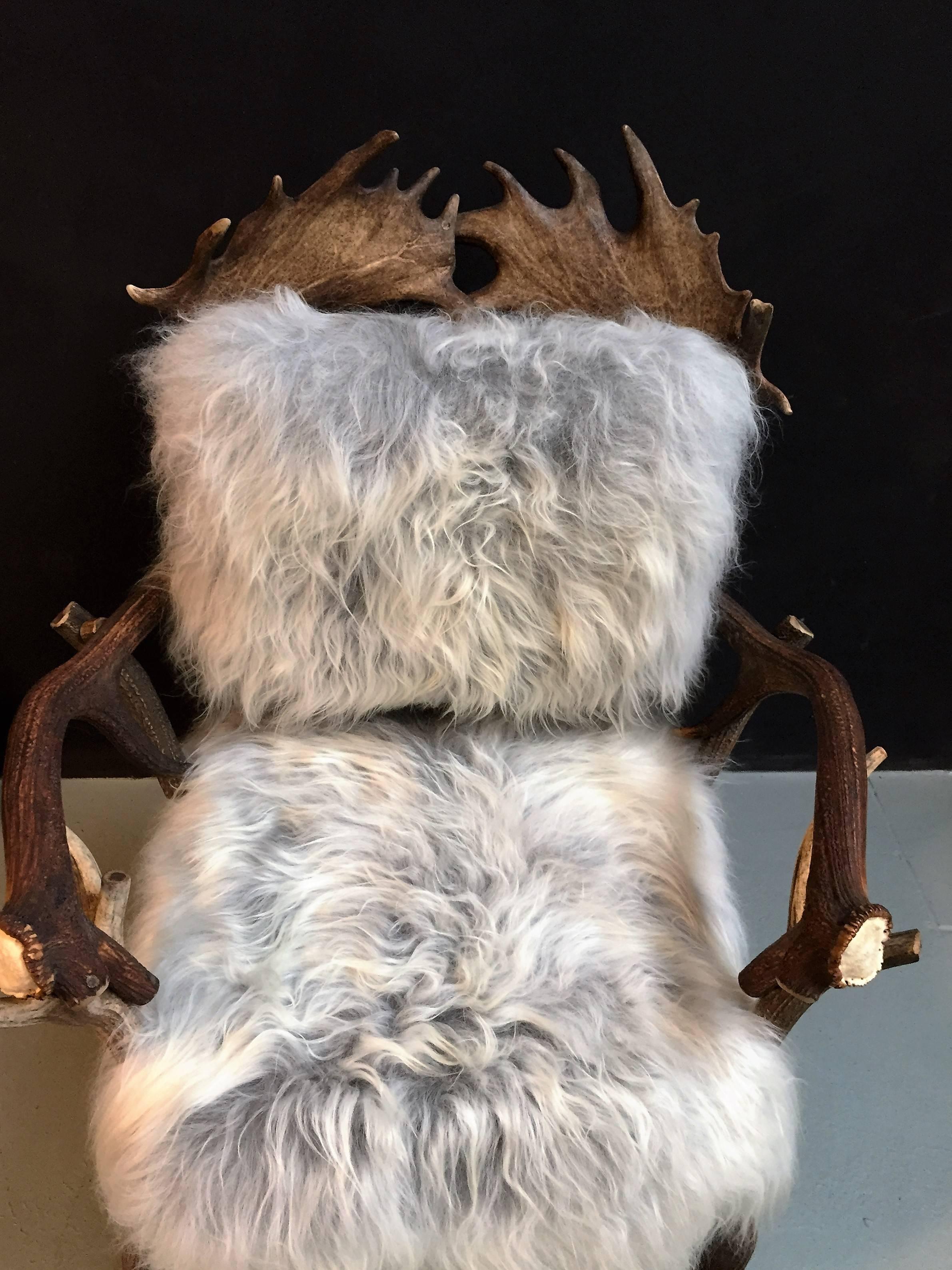 Contemporary Antler chair with grey Iceland sheepskin upholstery