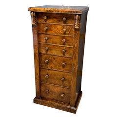 Antique walnut wellington chest of drawers with secretary