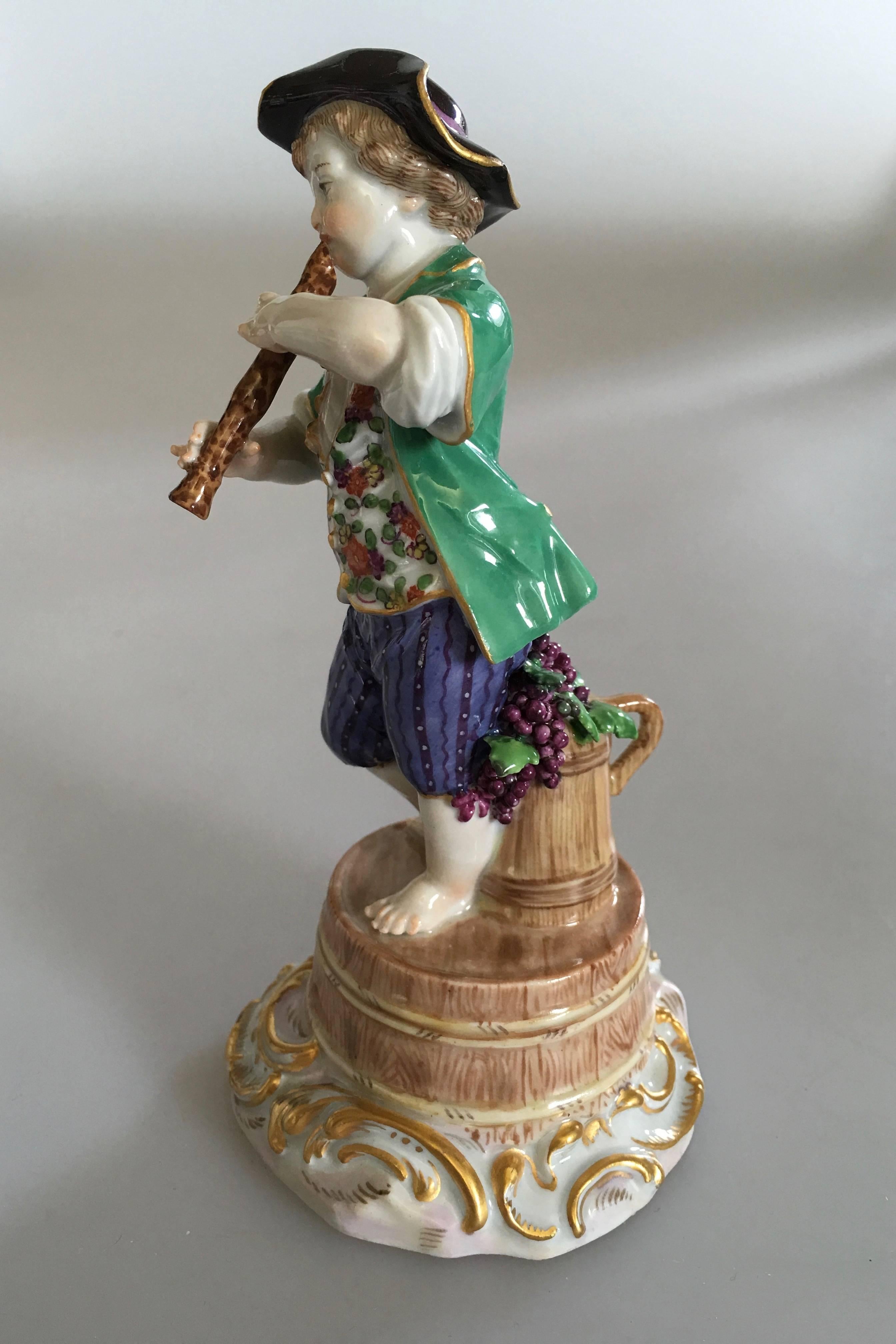 Meissen Figurine of Boy with Flute and Wine Barrel. Likely from after 1934 