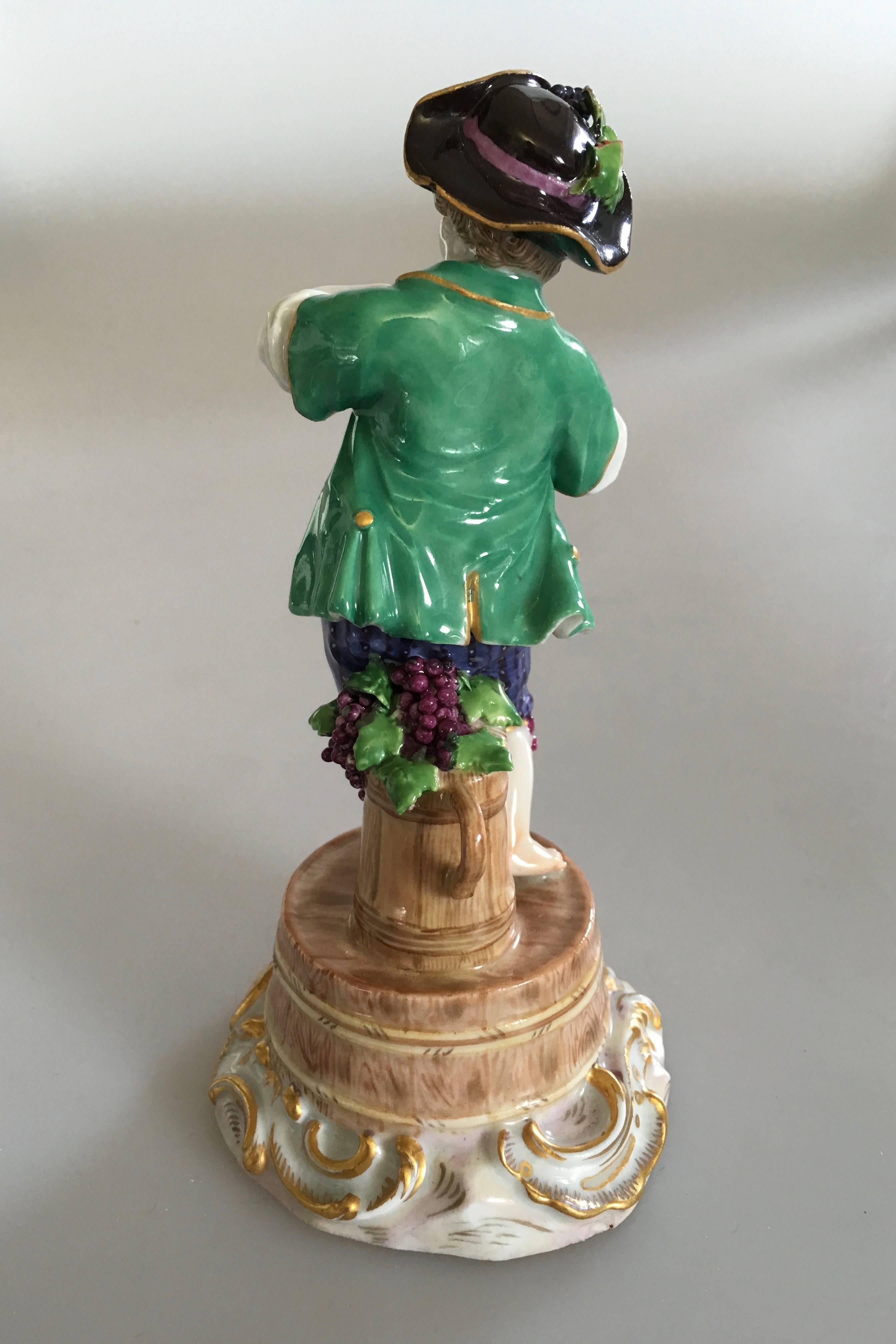 German Meissen Figurine of Boy with Flute and Wine Barrel