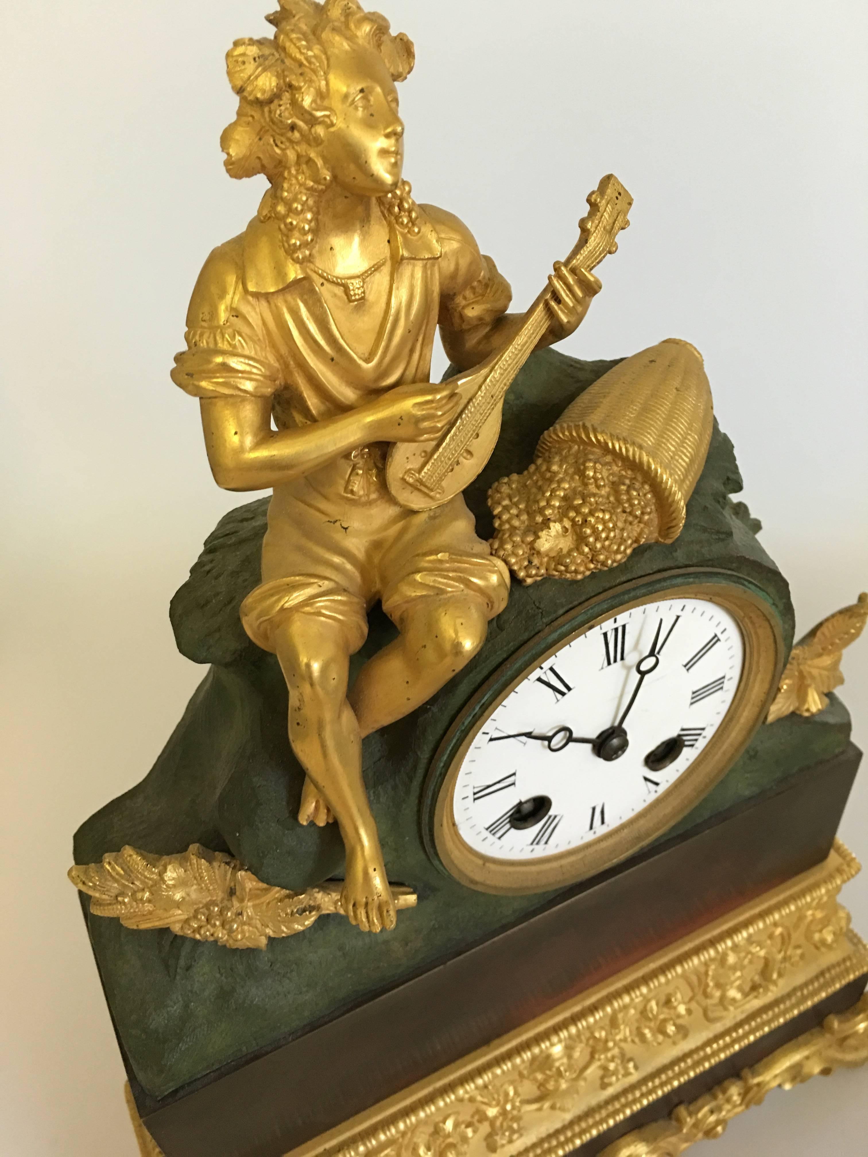 Neoclassical Antique Bronze and Partly Gilded Bracket Clock with Sitting Dionysus For Sale