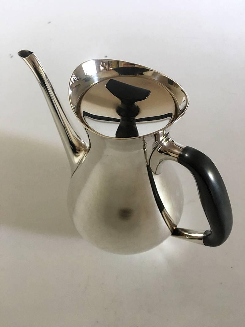 Cohr H.P. Jacobsen coffee pot in sterling silver.

Measures: 20.5cm / 8 1/10