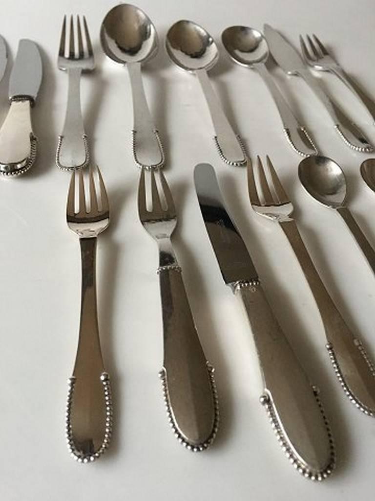 Art Deco Georg Jensen Sterling Silver Beaded Flatware Set for Four Persons, 56 Pieces For Sale