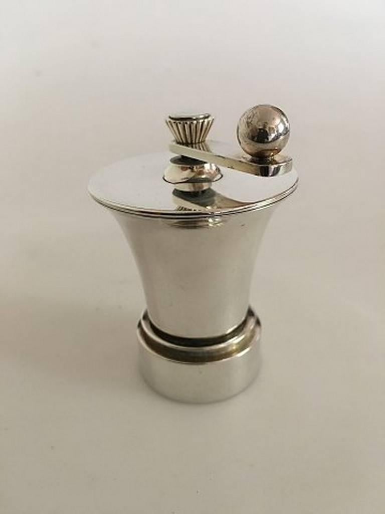 Georg Jensen pyramid pepper mill in sterling silver by Harald Nielsen #632B. 
Measures 7.4 cm / 2 9/10 in.
 