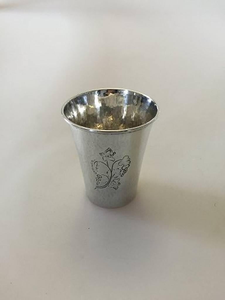 Early Georg Jensen Sterling Silver cup #371A. Measures 7cm and is in good condition. Except a few dents. Is engraved.