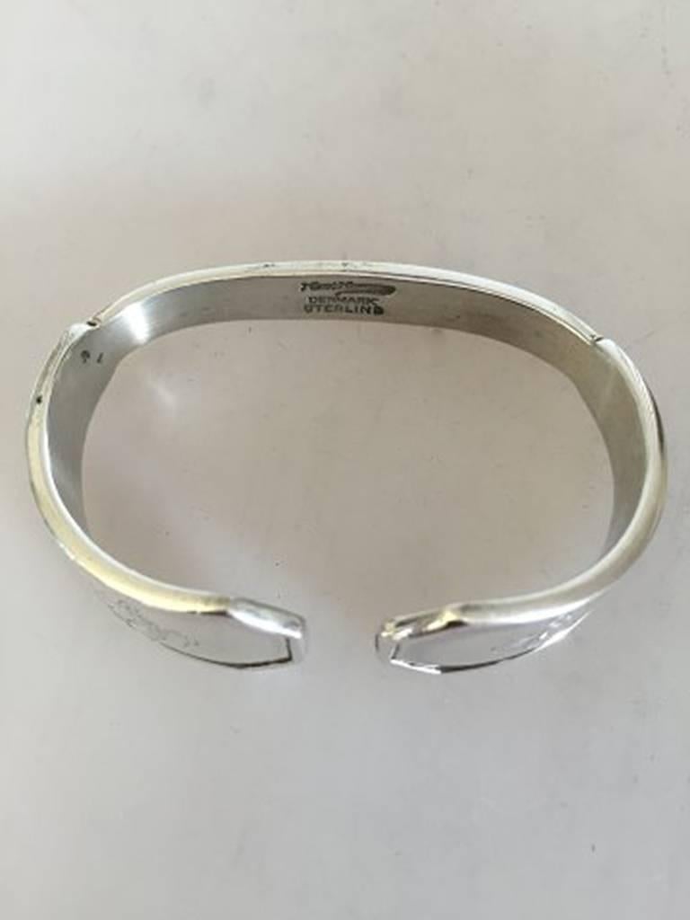 Hans Hansen silver napkin ring. Weighs 27 g (0.90 oz). Height measures 3.5 cm (1 3/8 in).