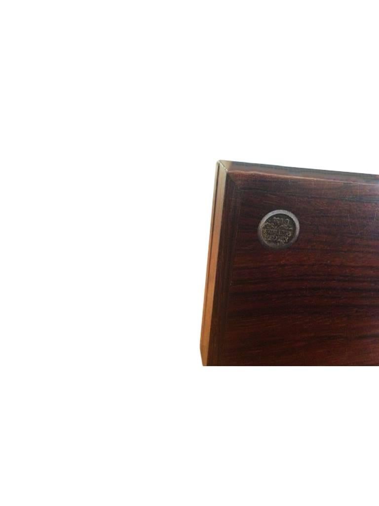 Hans Hansen sterling silver rosewood box. Measures 21cm x 8cm x 3.5cm and is in good condition.