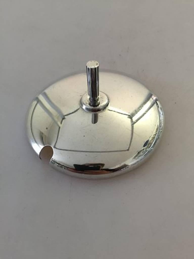 Danish E. Dragsted sterling silver modern marmelade lid #20

Measures: 8.4 cm in diameter (3 5/16 in), 4.3 cm height (1 11/16 in).