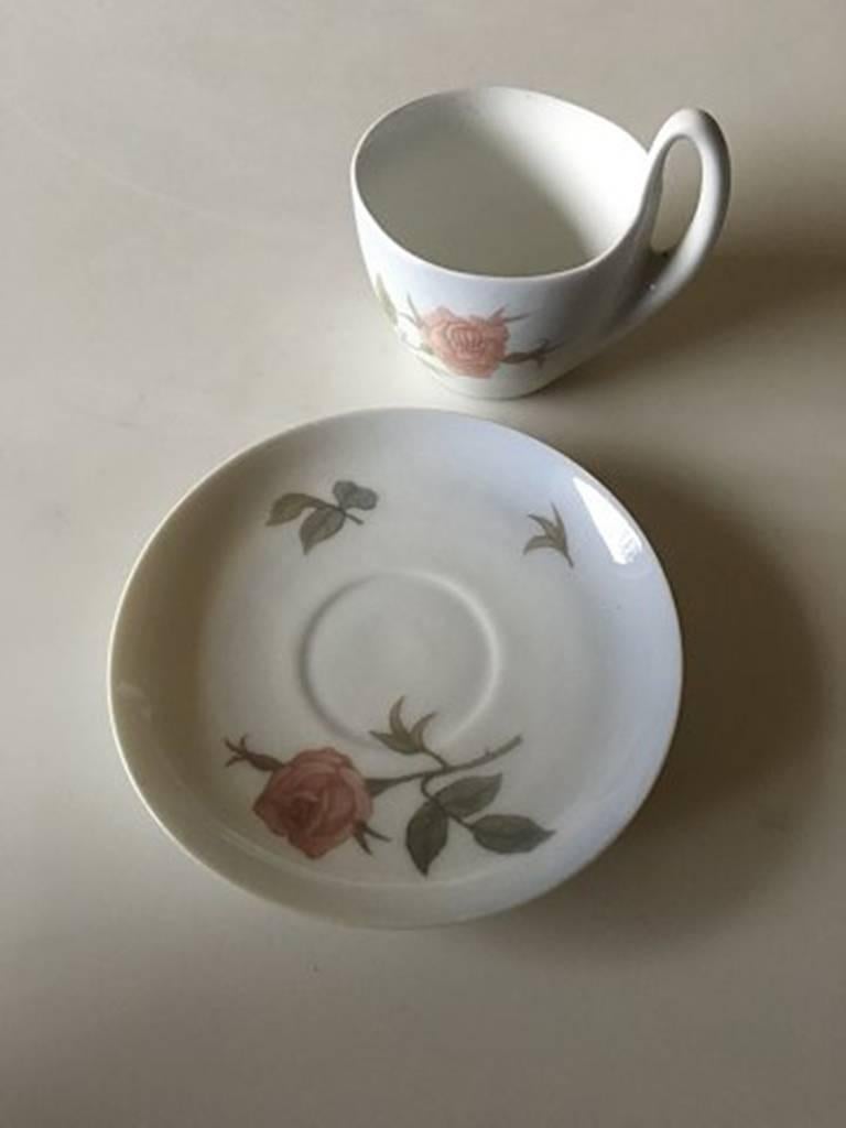 Royal Copenhagen Art Nouveau small high handled cup and saucer. No. 689/4. The cup and saucer are in nice whole condition. Measures: 5.2 cm H (8 cm measured to the top of the handle). 2nd quality.