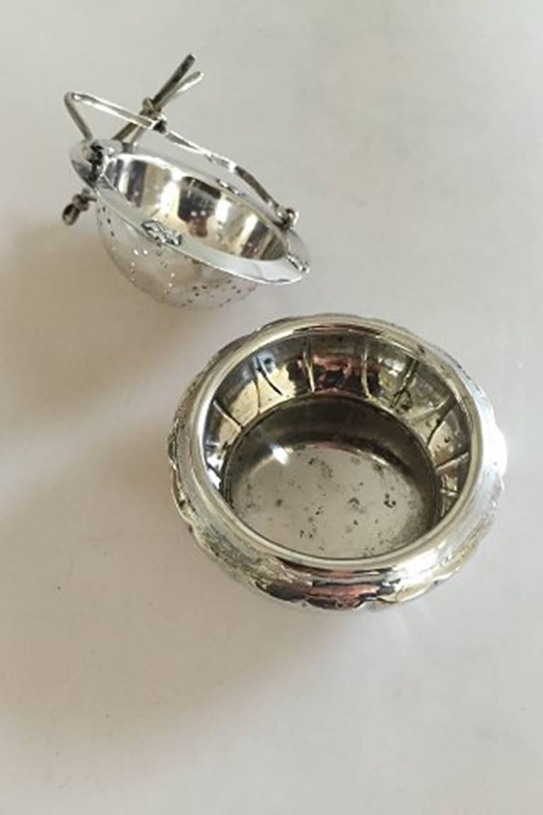 Art Nouveau Danish Tea Strainer and Holder in Silver For Sale