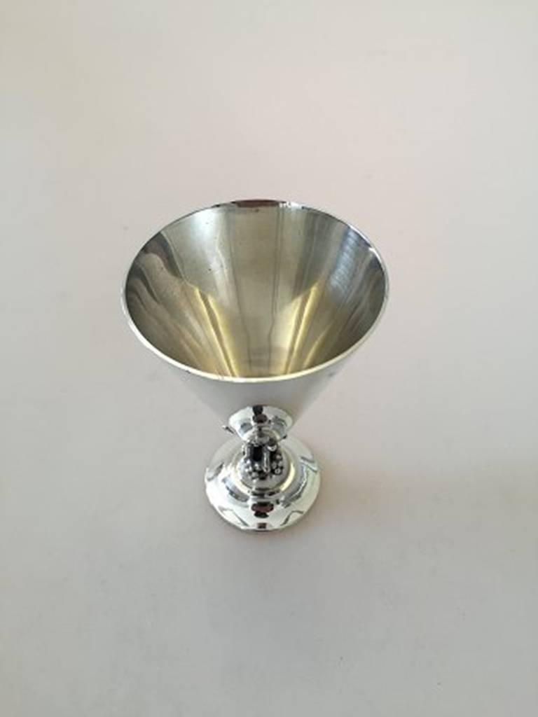 Sterling silver sherry glass. Height measures 10 cm (3 15/16 in), while the diameter measures 6.5 cm (2 9/16 in). Weight is 100 g (3.55 oz).