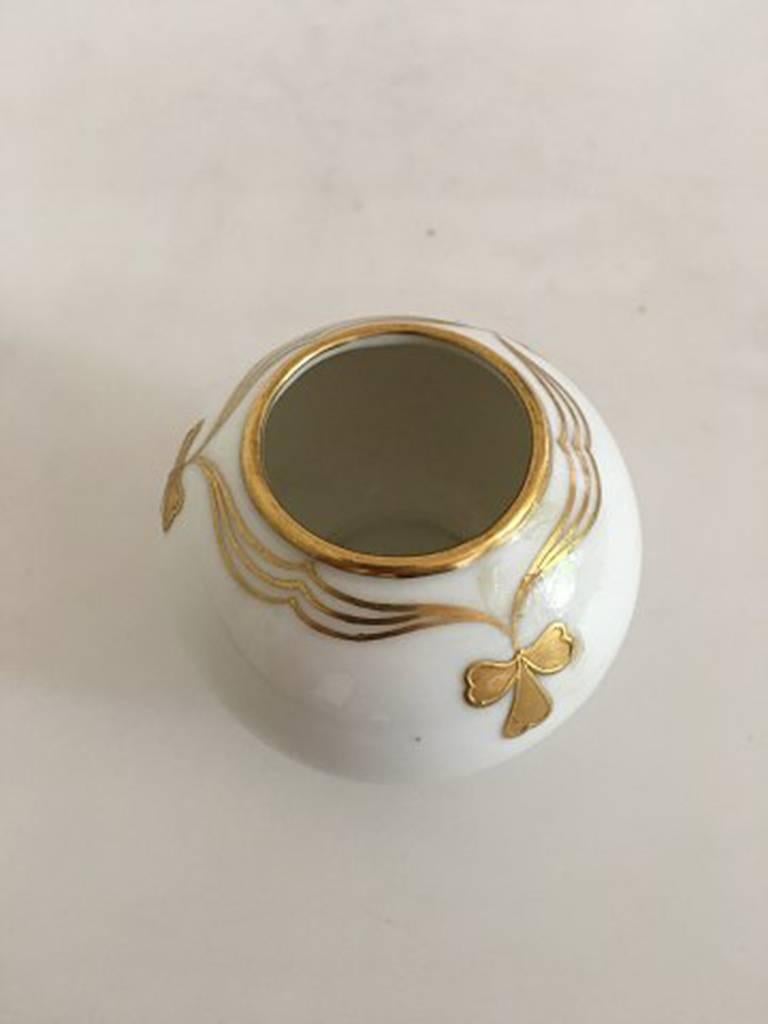 Royal Copenhagen vase #142/42A with gold motif. Measure: 6 cm H (2 23/64 in). 1st Quality in good condition.