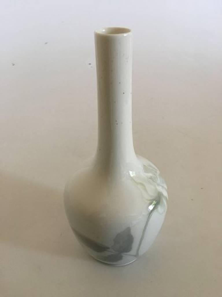 Royal Copenhagen Art Nouveau vase no. 615/43 with rose decoration. 1st quality, in fine condition. Has some coal specks around the neck of the vase. From 1889-1922.