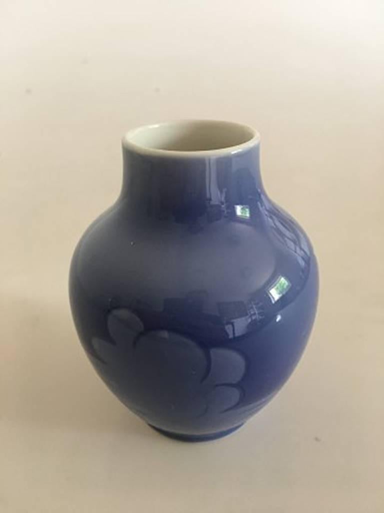 Royal Copenhagen vase #99/45A blue with swans. Measures: 10.5 cm (4 9/64 in). 2nd Quality. In nice whole condition.